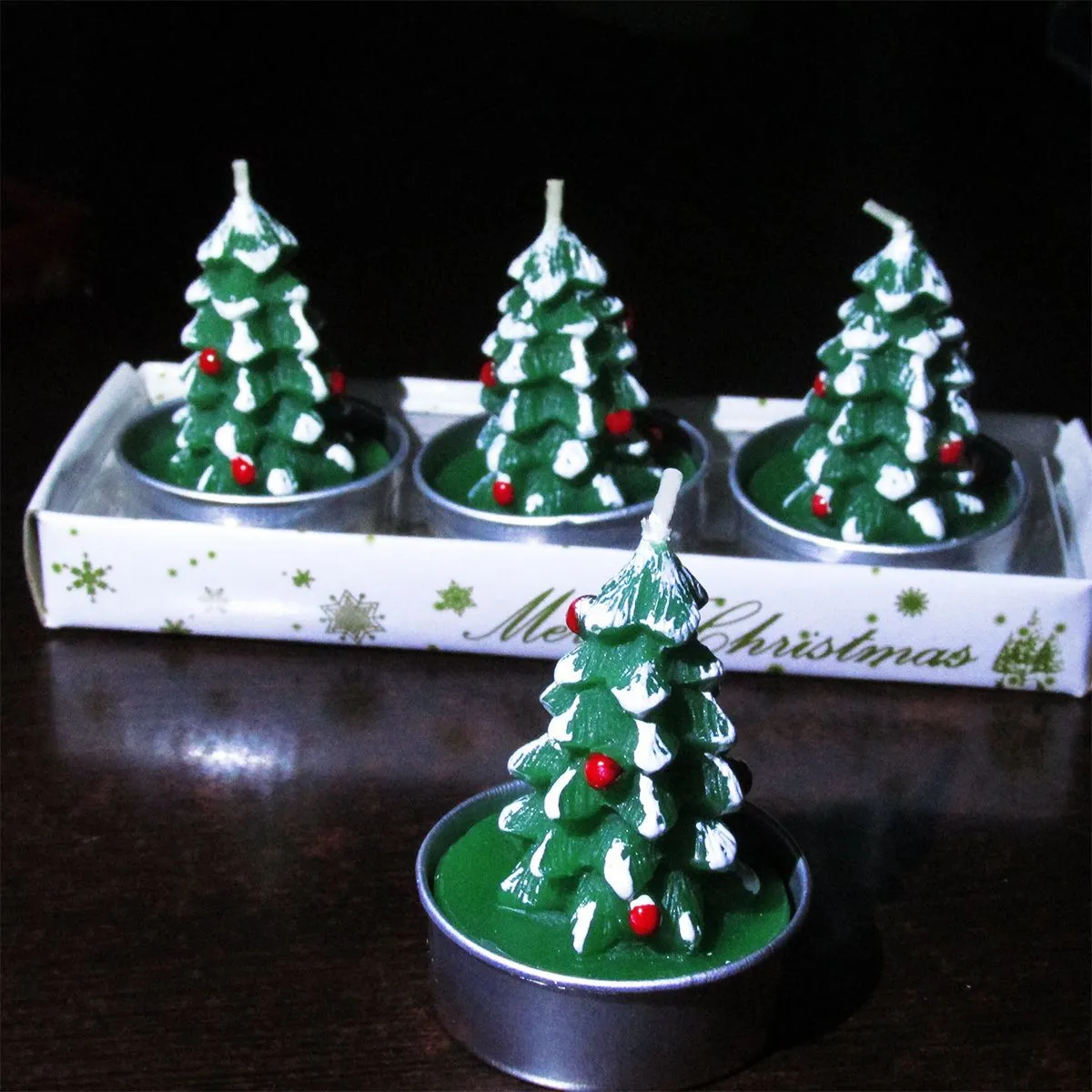 Romantic Christmas Eve gifts decorated with Christmas candles. Cute little aluminum shell-shaped candles for Christmas detail image 6
