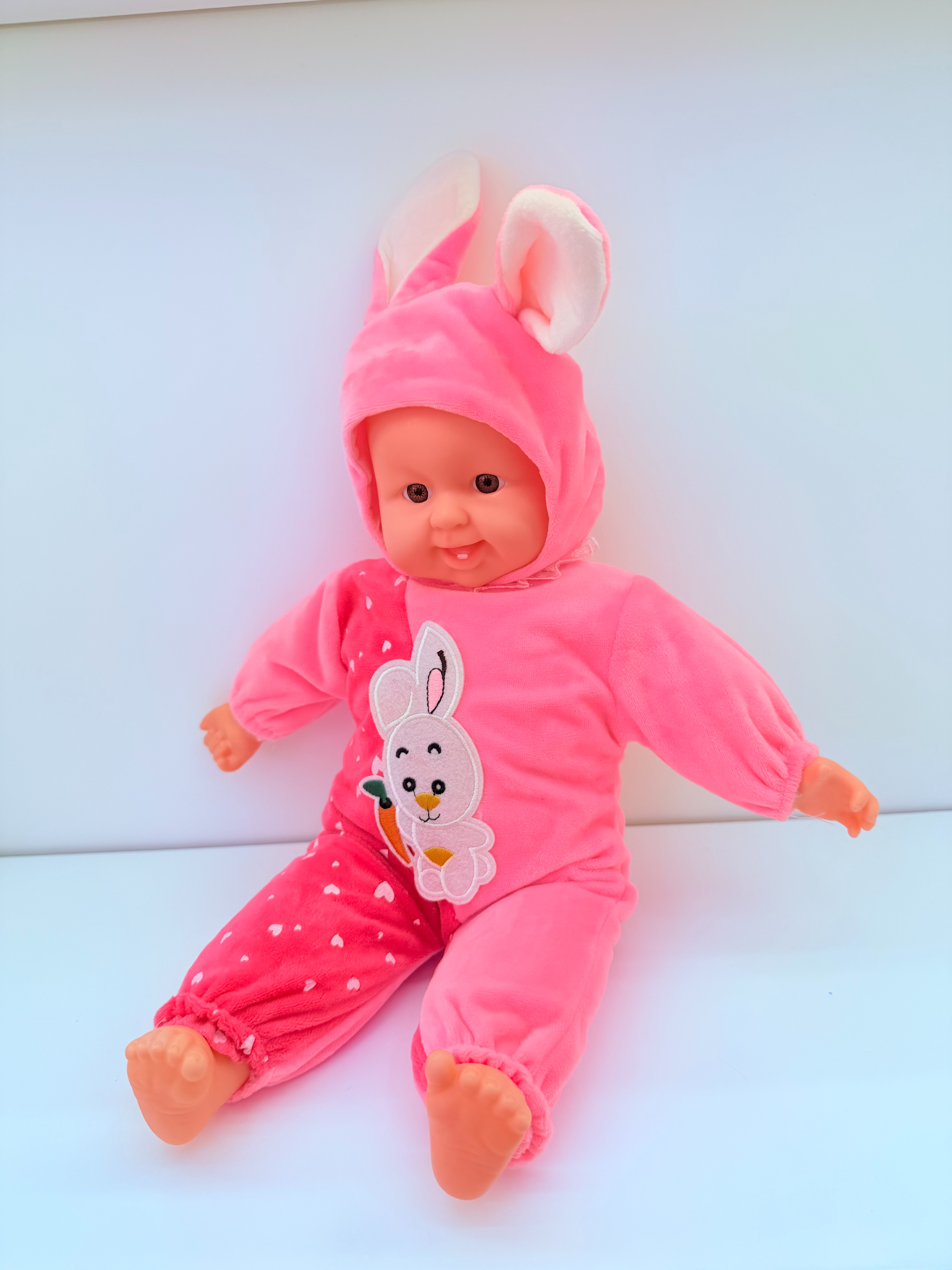 Muñeca mediana de la risa de la oreja de conejo apretar con la risa curar muñeca linda comercio exterior estilo explosivo Item Picture