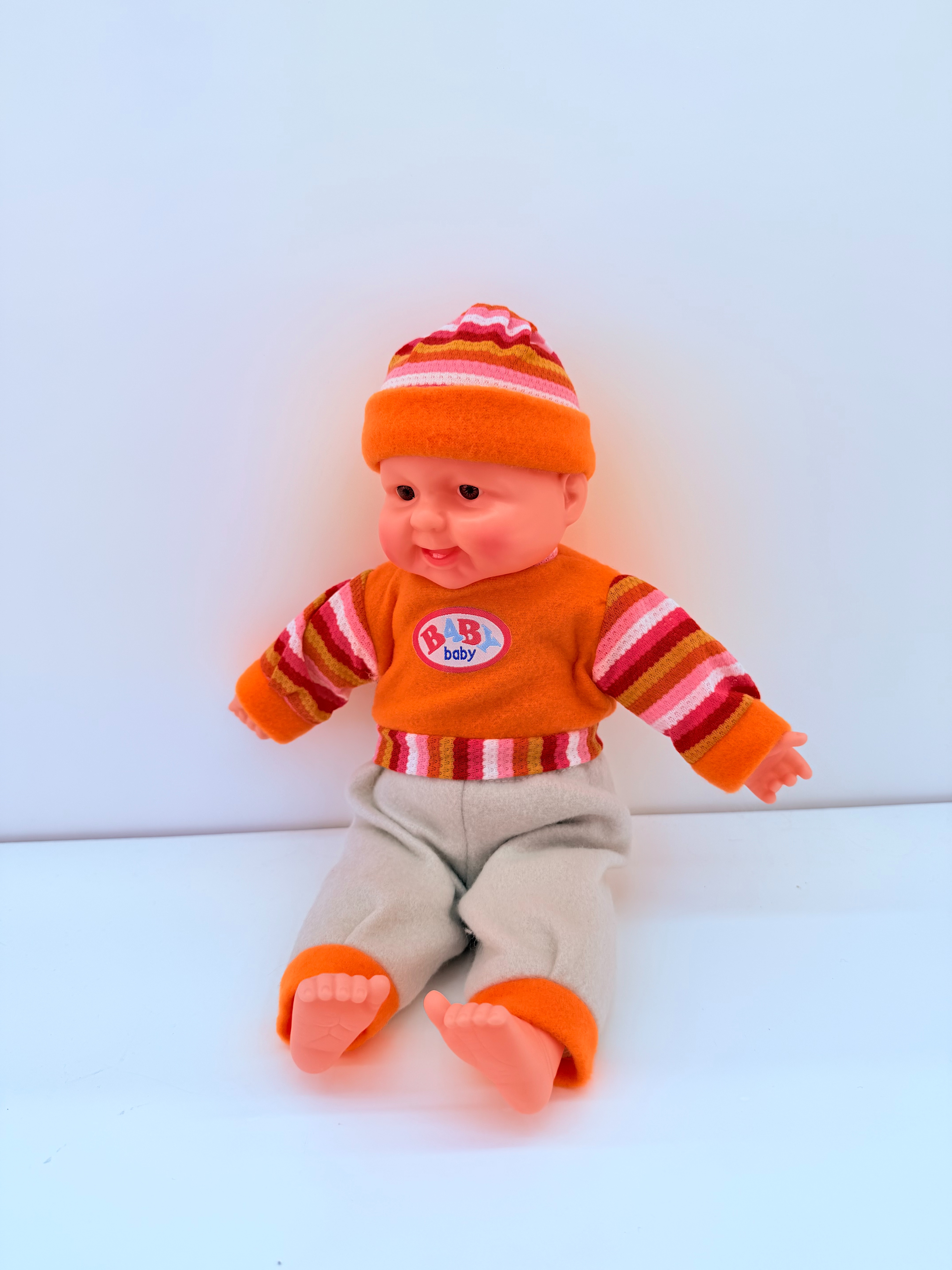 The new small-sized laughing doll with a squeeze and laughter lullaby comes in a variety of styles and is a bestseller in foreign trade Specification image