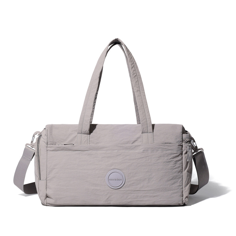 The new crossbody bag is simple, versatile, lightweight and has a large capacity. It is made of nylon fabric, a single-shoulder mummy bag, a commuting travel crossbody bag, a fitness bag, a yoga bag and a storage bag