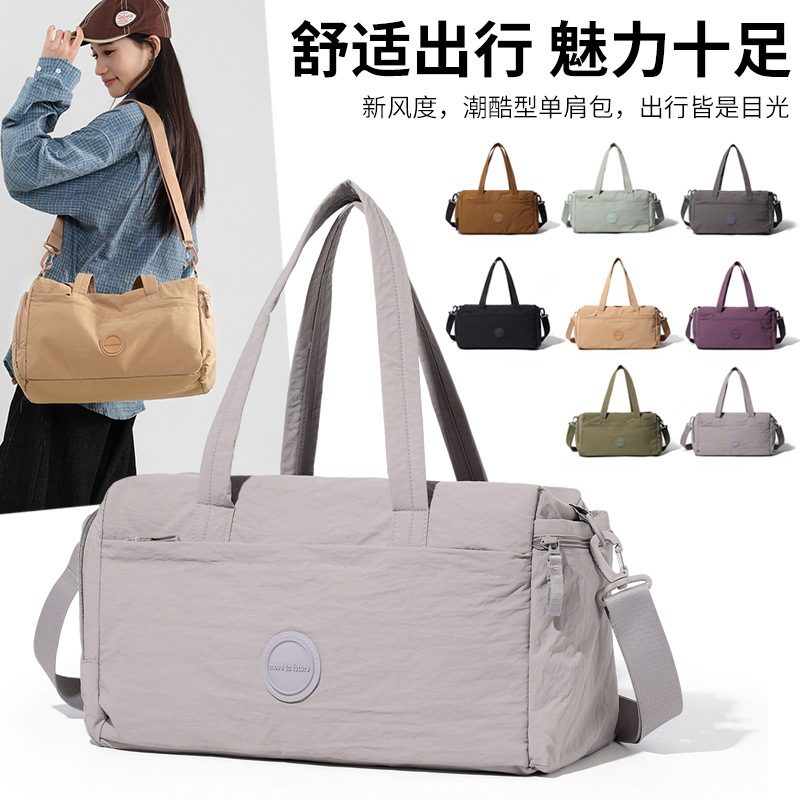 The new crossbody bag is simple, versatile, lightweight and has a large capacity. It is made of nylon fabric, a single-shoulder mummy bag, a commuting travel crossbody bag, a fitness bag, a yoga bag and a storage bag detail image 1