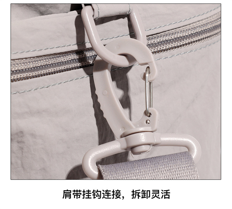 The new crossbody bag is simple, versatile, lightweight and has a large capacity. It is made of nylon fabric, a single-shoulder mummy bag, a commuting travel crossbody bag, a fitness bag, a yoga bag and a storage bag detail image 3