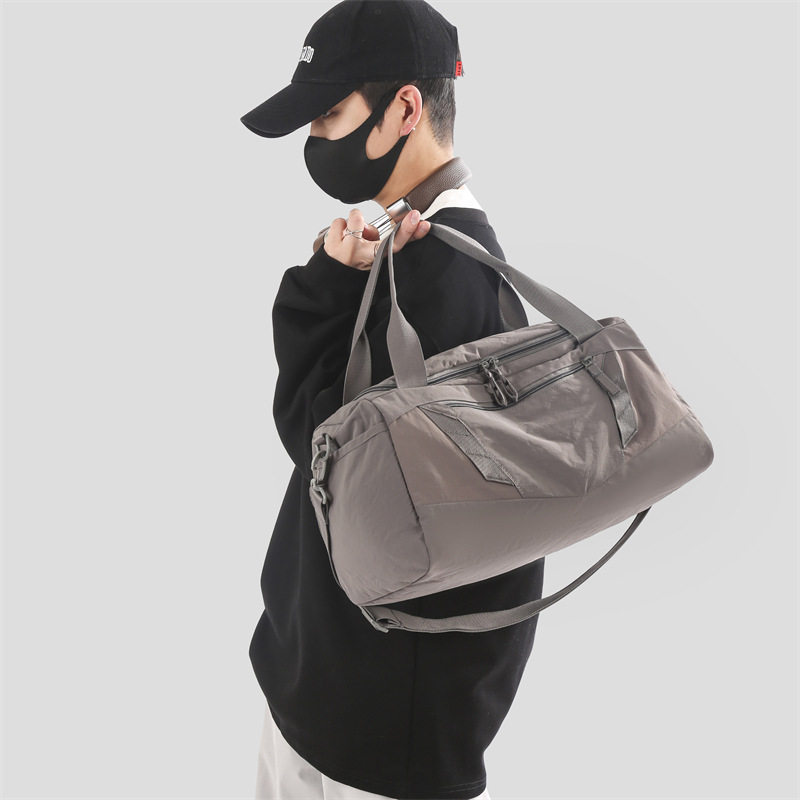 Short-distance travel bag, fitness bag, fashionable sports bag, dry and wet separation, large-capacity pressure-reducing hand-held travel bag with shoe compartment details Picture