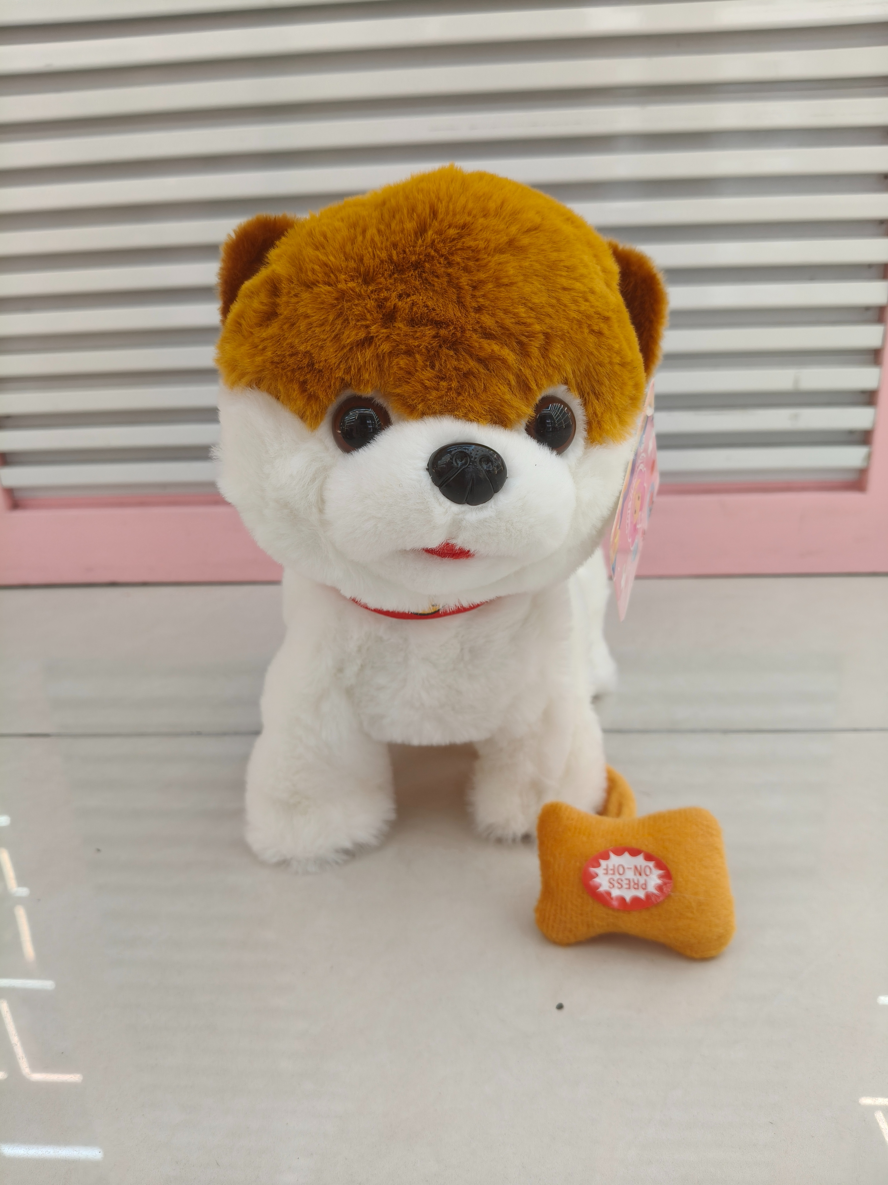A children's toy dog that can sing while walking is a simulation of a plush electric leash dog from Shenbo Mei with 60 songs details Picture