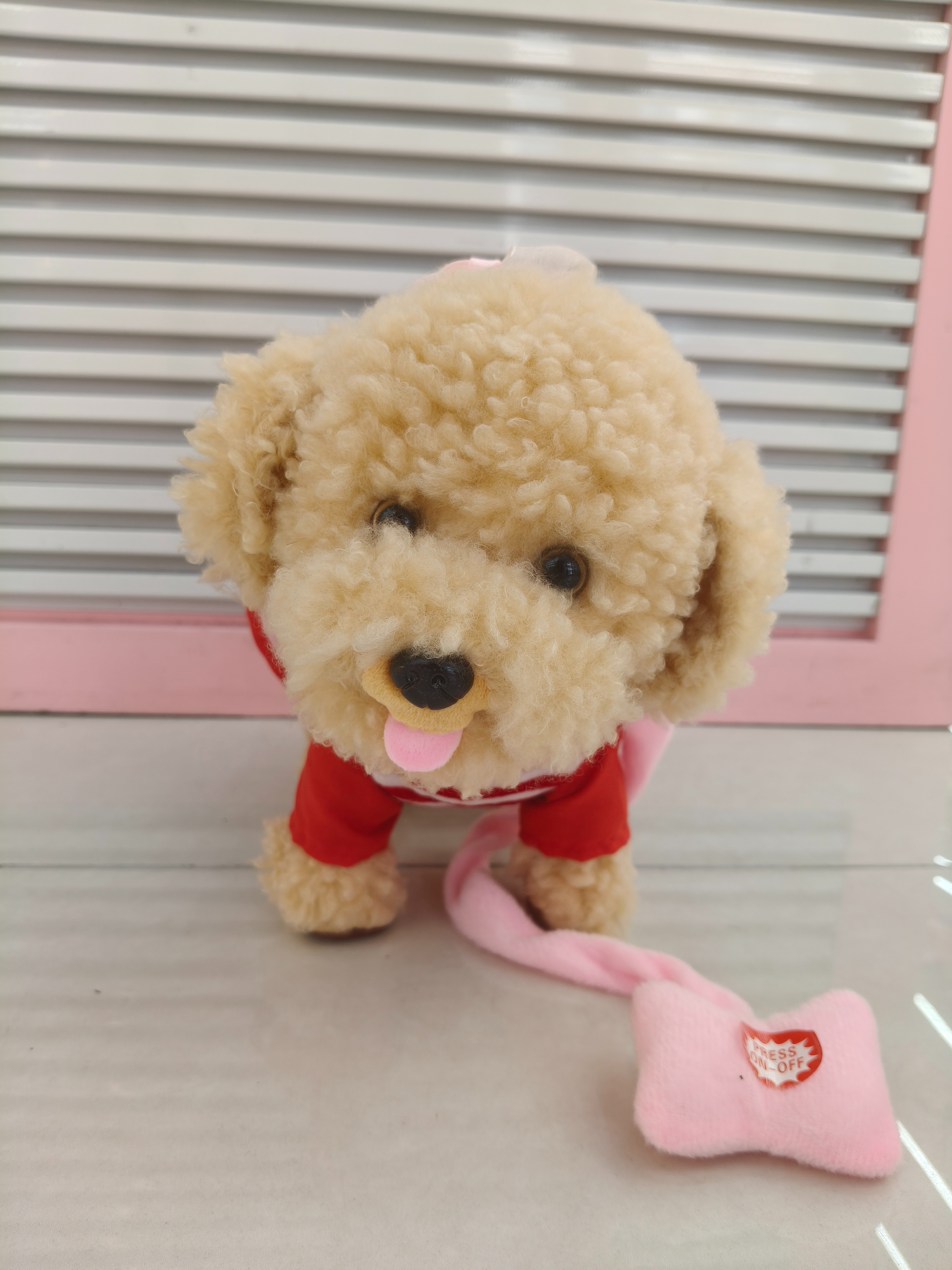 A simulated little dog children's toy with 60 songs and a leash that can walk and lick its tongue Application Scenario