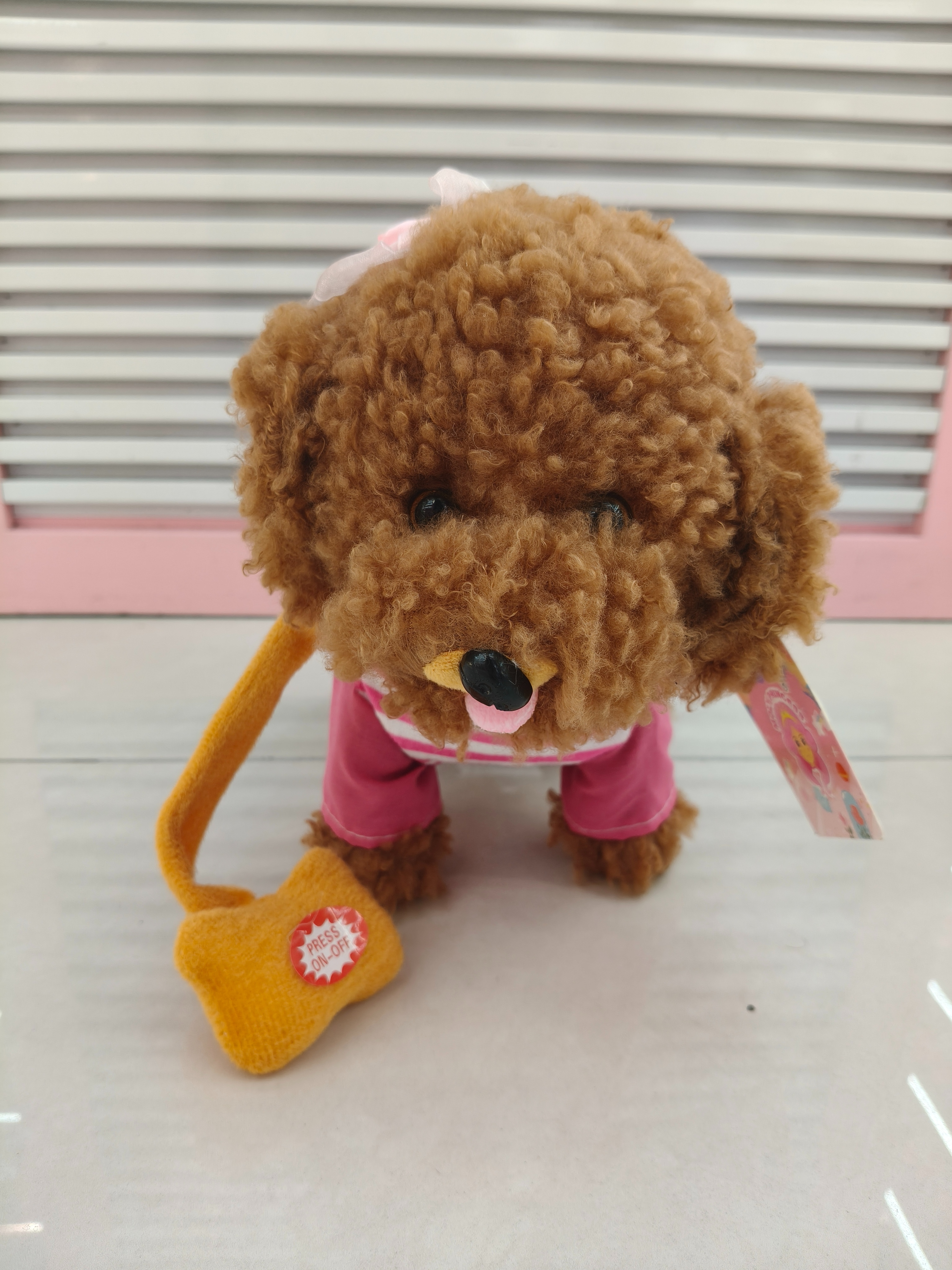 60 songs for a brown curly-haired toy dog that can walk, lick its tongue and wear a leash details Picture