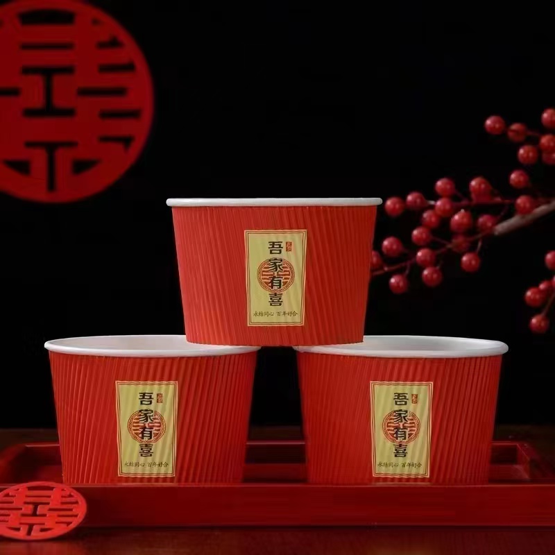 Three red Double Happiness paper cups, stacked on a red tray detail image 2