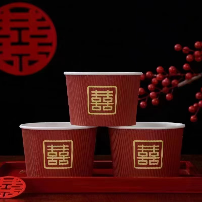 Three red Double Happiness paper cups, stacked on a red tray detail image 1