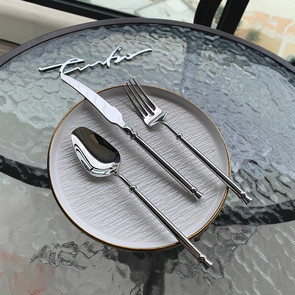 304 silver premium stainless steel knife, fork and spoon cylindrical handle high-end restaurant spoon and fork set details Picture