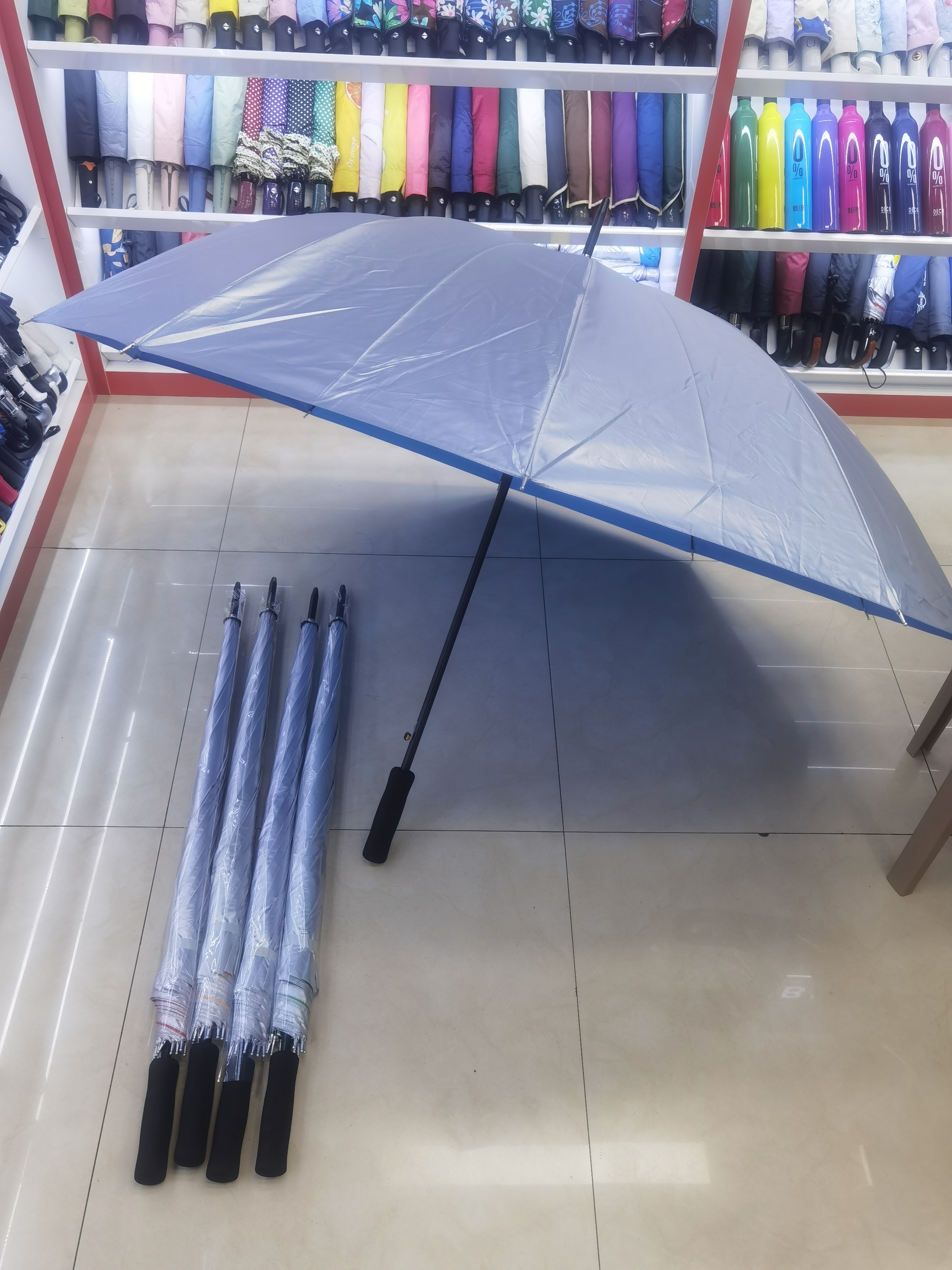 Anti-silver rubber straight rod long umbrella, enlarged and thickened 10-bone silver rubber umbrella, automatic EVA handle export umbrella details Picture