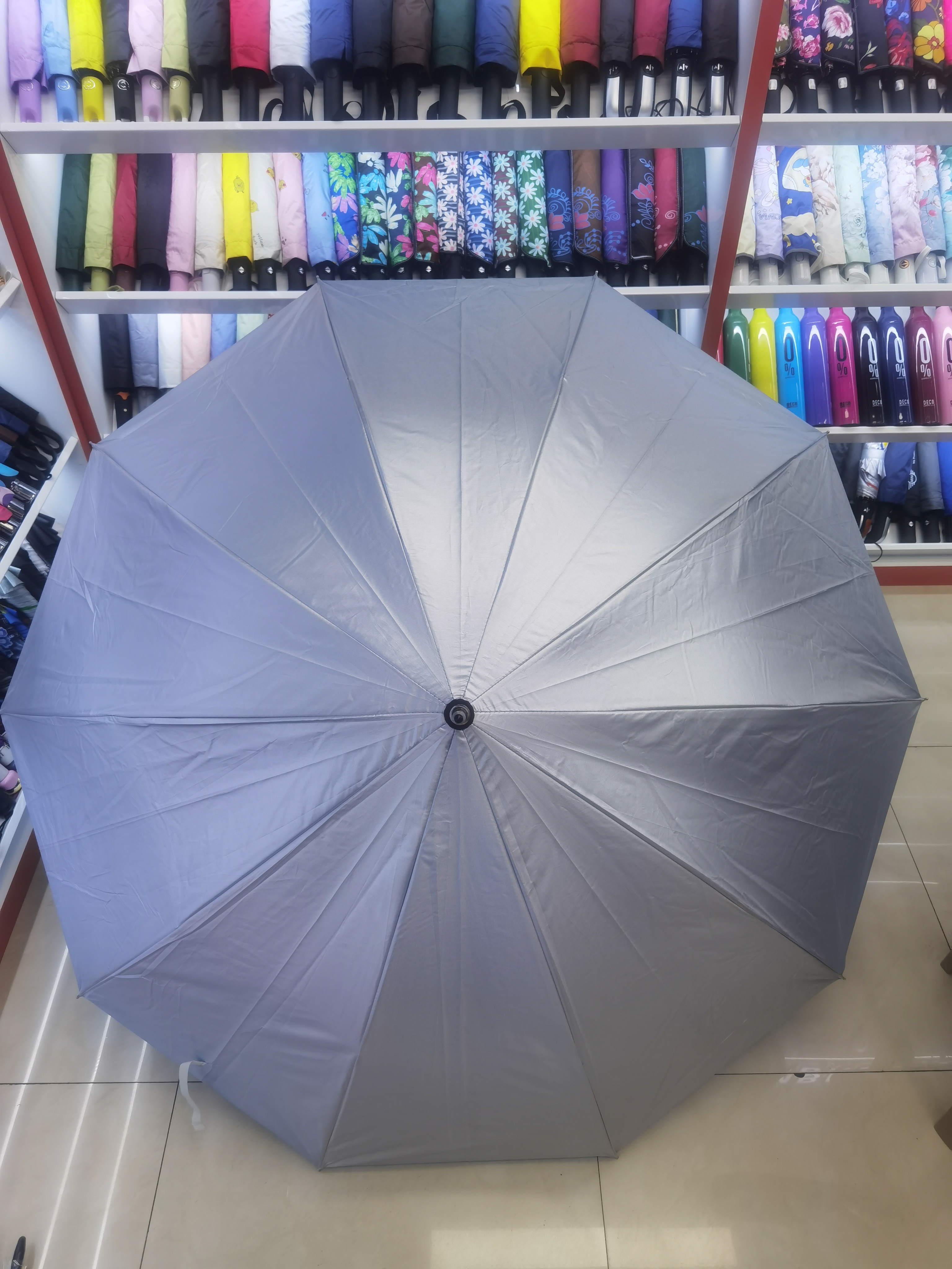 Anti-silver rubber straight rod long umbrella, enlarged and thickened 10-bone silver rubber umbrella, automatic EVA handle export umbrella Specification image