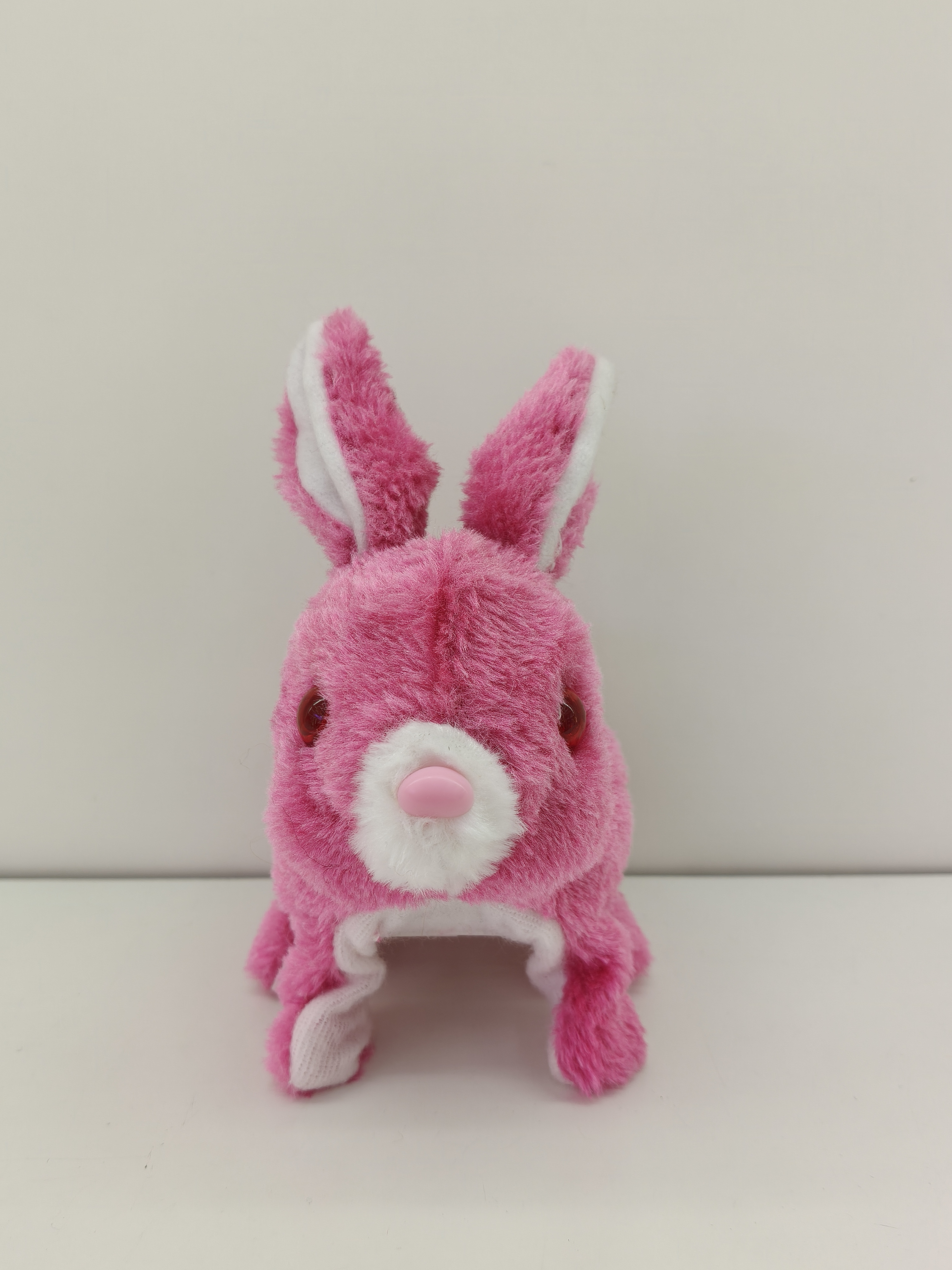 The red-eyed colorful rabbit can walk, make sounds and has bright eyes. It's a plush toy of a colorful puppy, a cute puppy toy for children Specification image