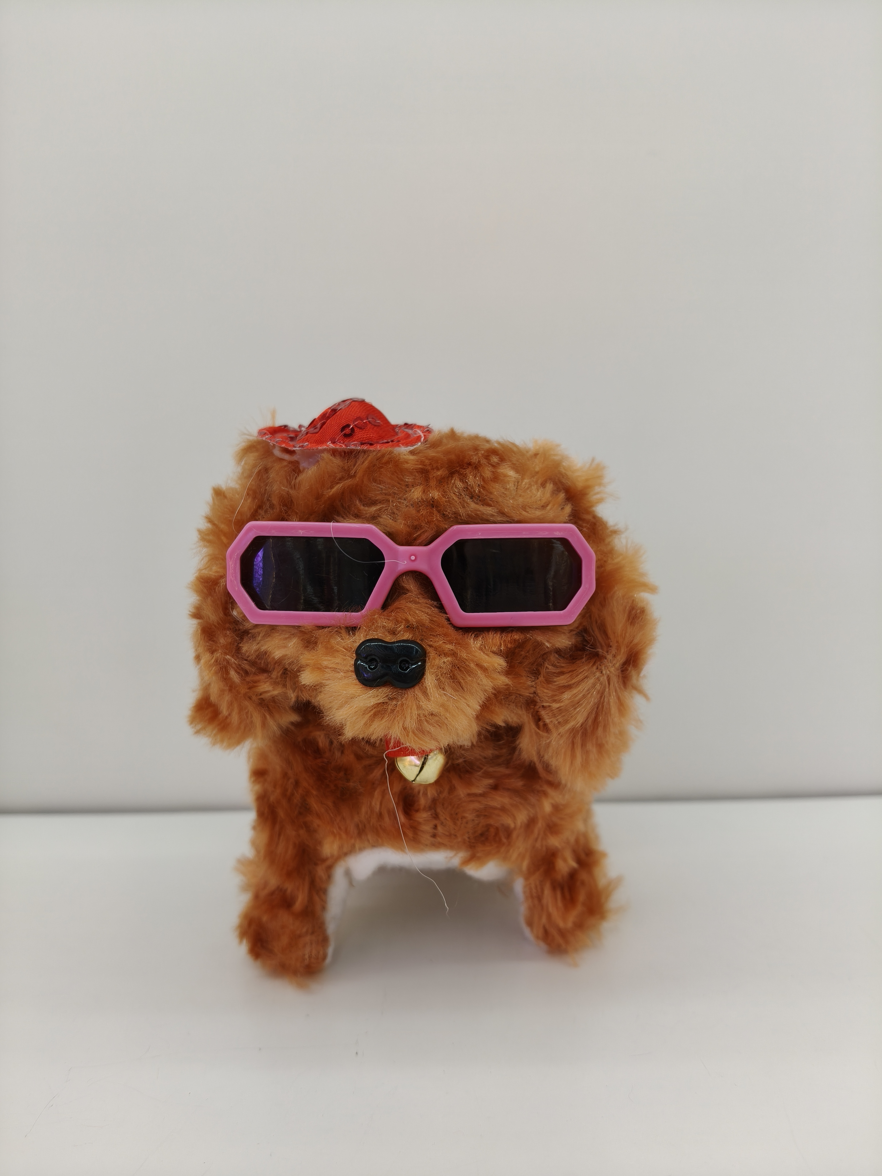 Sunglasses, hat, dog, plush puppy doll, a cute toy puppy that can walk and bark details Picture
