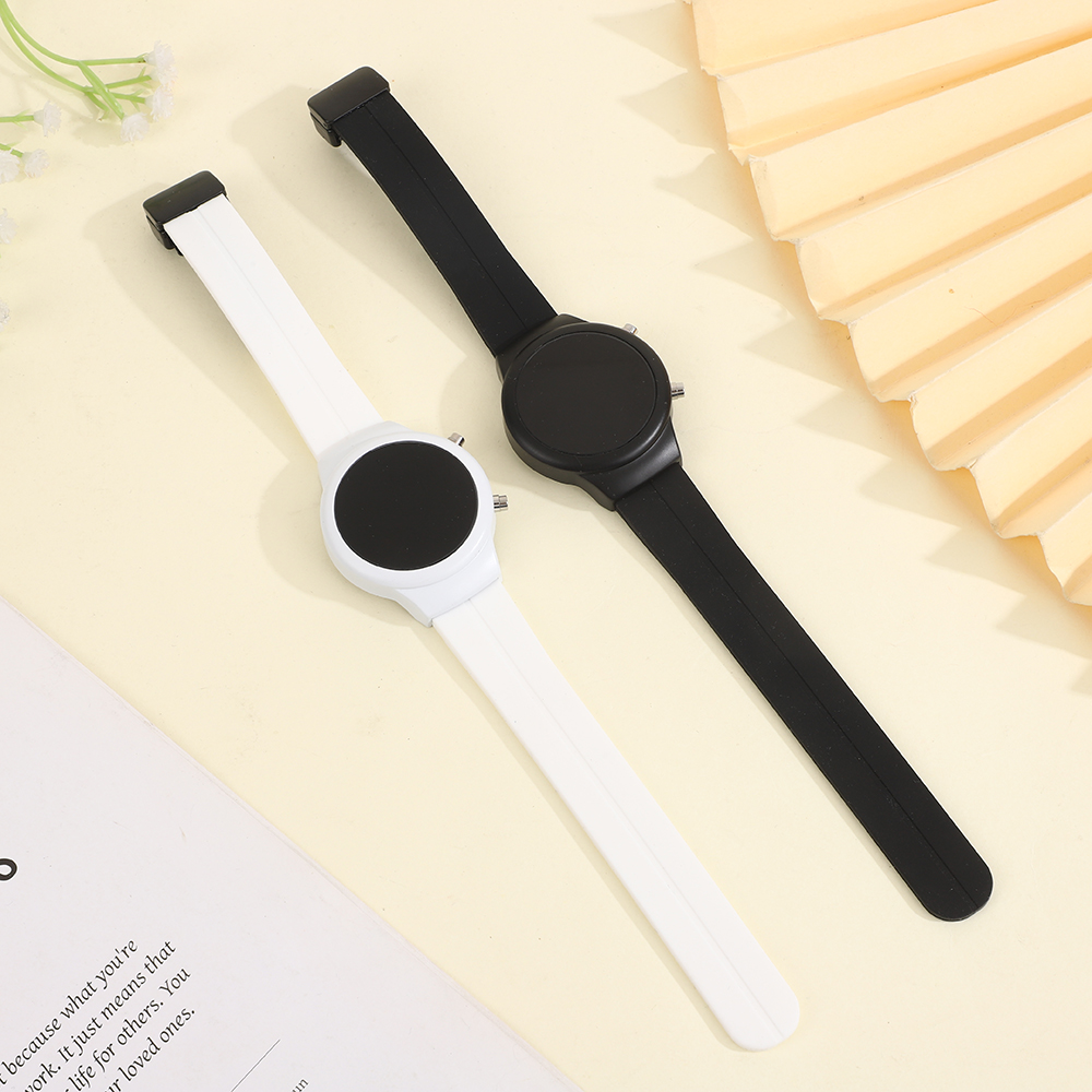 This color LED electronic watch is designed for students and is suitable for both men and women. It features a simple circular digital display with clear luminous time and date. The silicone strap and skin-friendly magnetic clasp make it easy to wear. It is a simple, versatile and elegant electronic watch details Picture