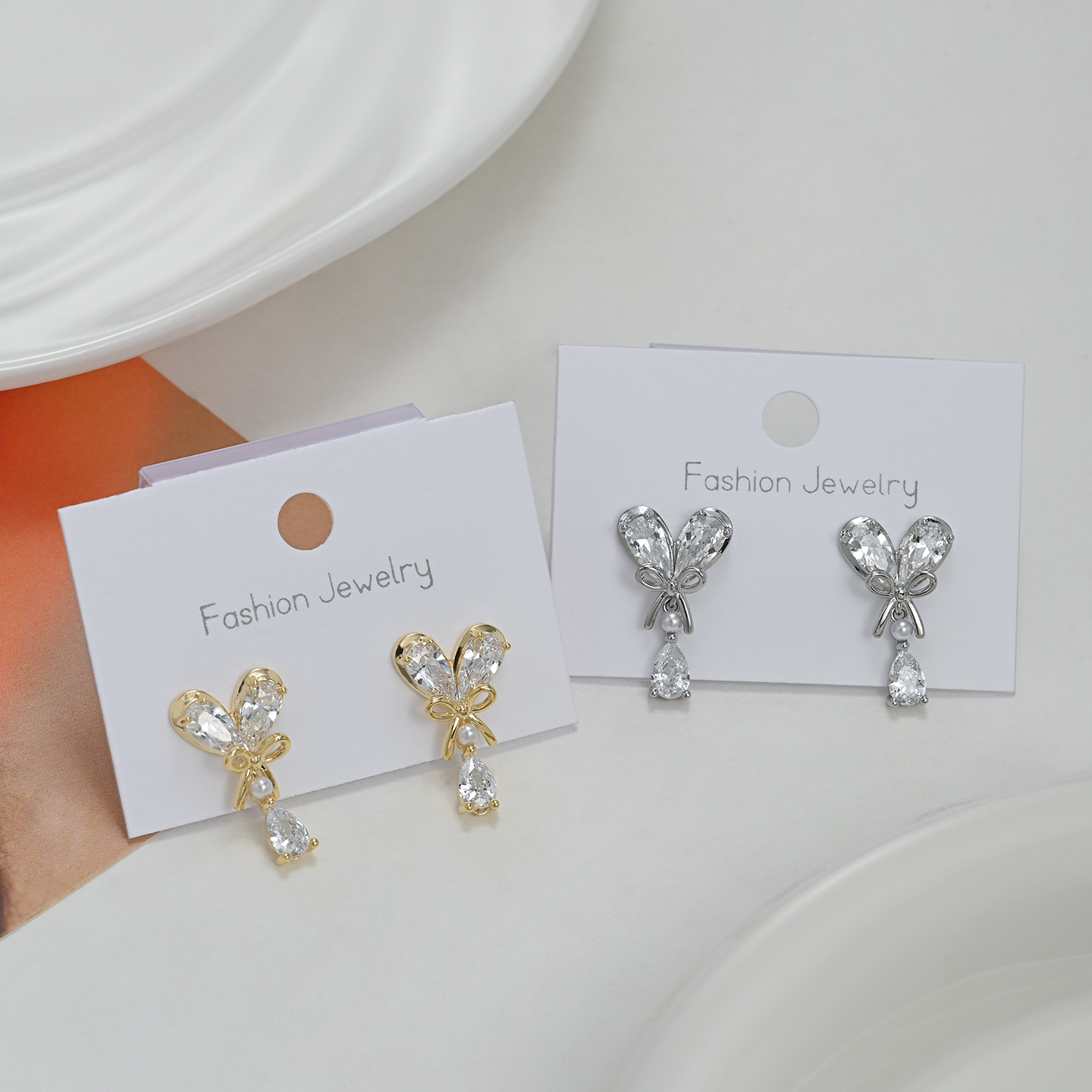 白色蝴蝶结水晶耳环 金银双色配珍珠水滴吊坠 附Fashion Jewelry卡片详情1