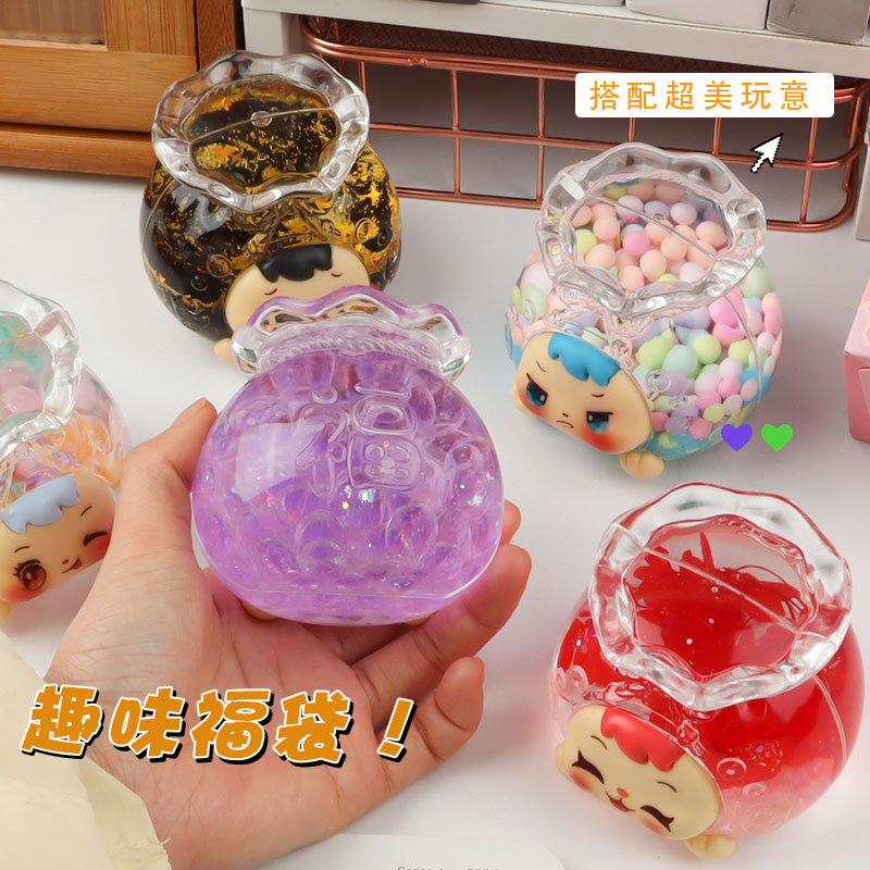 A five-piece set of "Flowing Sand Lucky Bag" ornaments in the shape of a sailboat, featuring a cartoon and cute glass texture Application Scenario