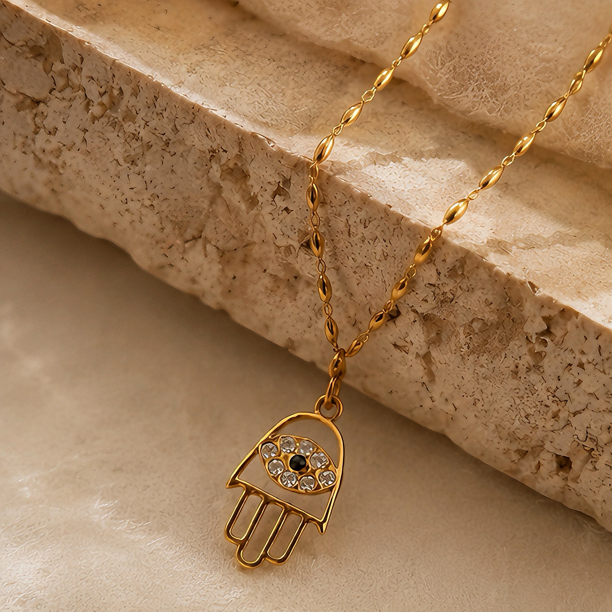 French retro Fatima Hand Devil Eye necklace, light luxury diamond-encrusted pendant, versatile rice grain chain, commuting niche collarbone chain, anti-color fading stainless steel color retention accessory Application Scenario