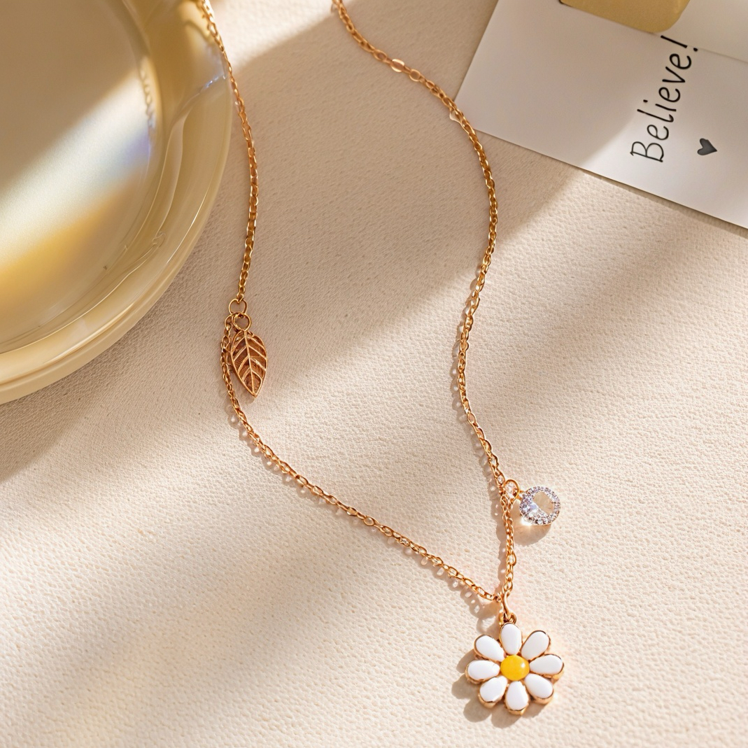 Korean-style enamel Daisy rose gold collarbone chain with hollowed-out leaves and small diamonds creative jewelry. A versatile and niche luxury gift necklace for fair-haired girls in spring and summer Specification image