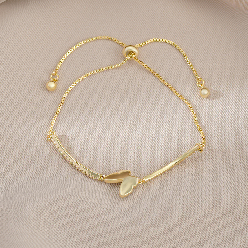 A new best-selling, niche and unique golden bow bracelet with a pull-out design, featuring genuine gold plating Specification image
