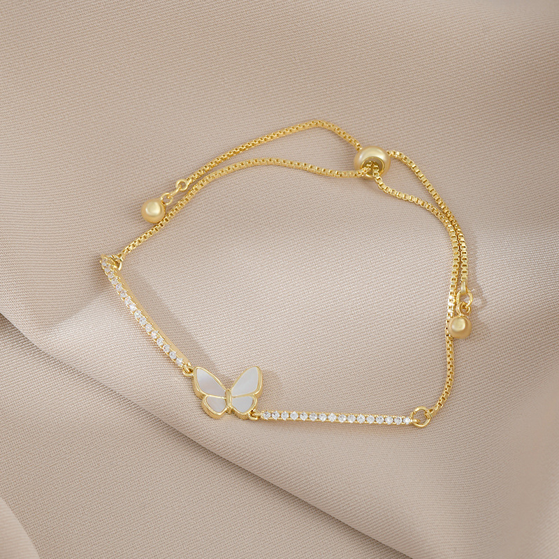 A new best-selling, niche and unique golden bow bracelet with a pull-out design, featuring genuine gold plating details Picture