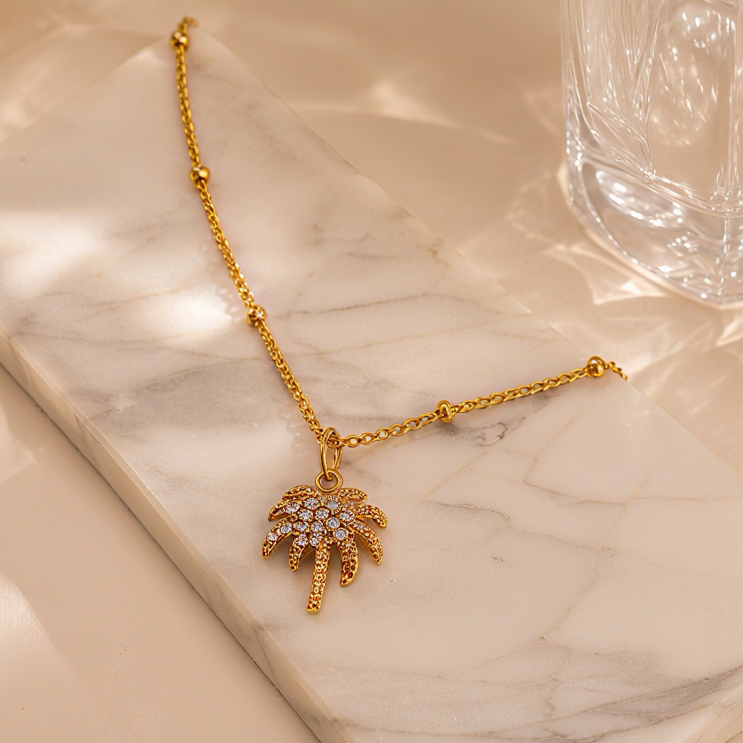 Full diamond palm tree golden pendant necklace, vacation style, niche stainless steel accessory, refreshing summer, versatile for seaside outfits, collarbone jewelry Application Scenario