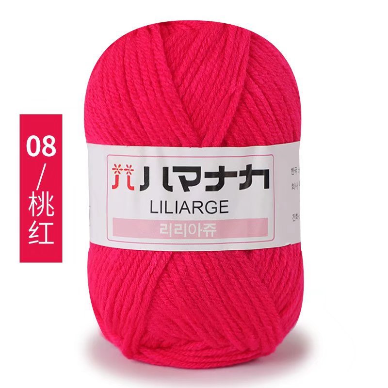 Hand-woven decorative wool balls in rose red detail image 1