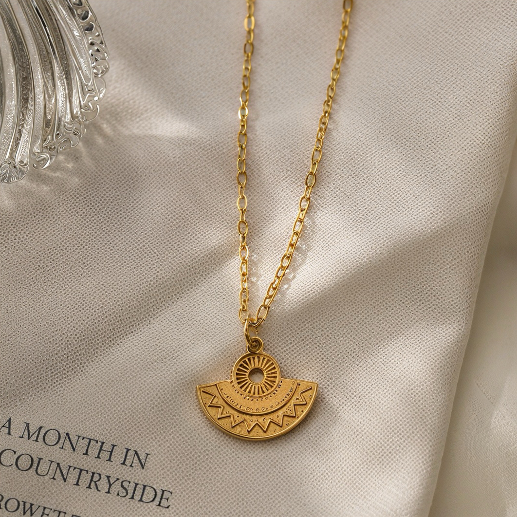 Geometric fan-shaped sun relief pendant, flat oval fine gold necklace, retro aged stainless steel jewelry, exotic tribal style, niche stacked collarbone chain details Picture