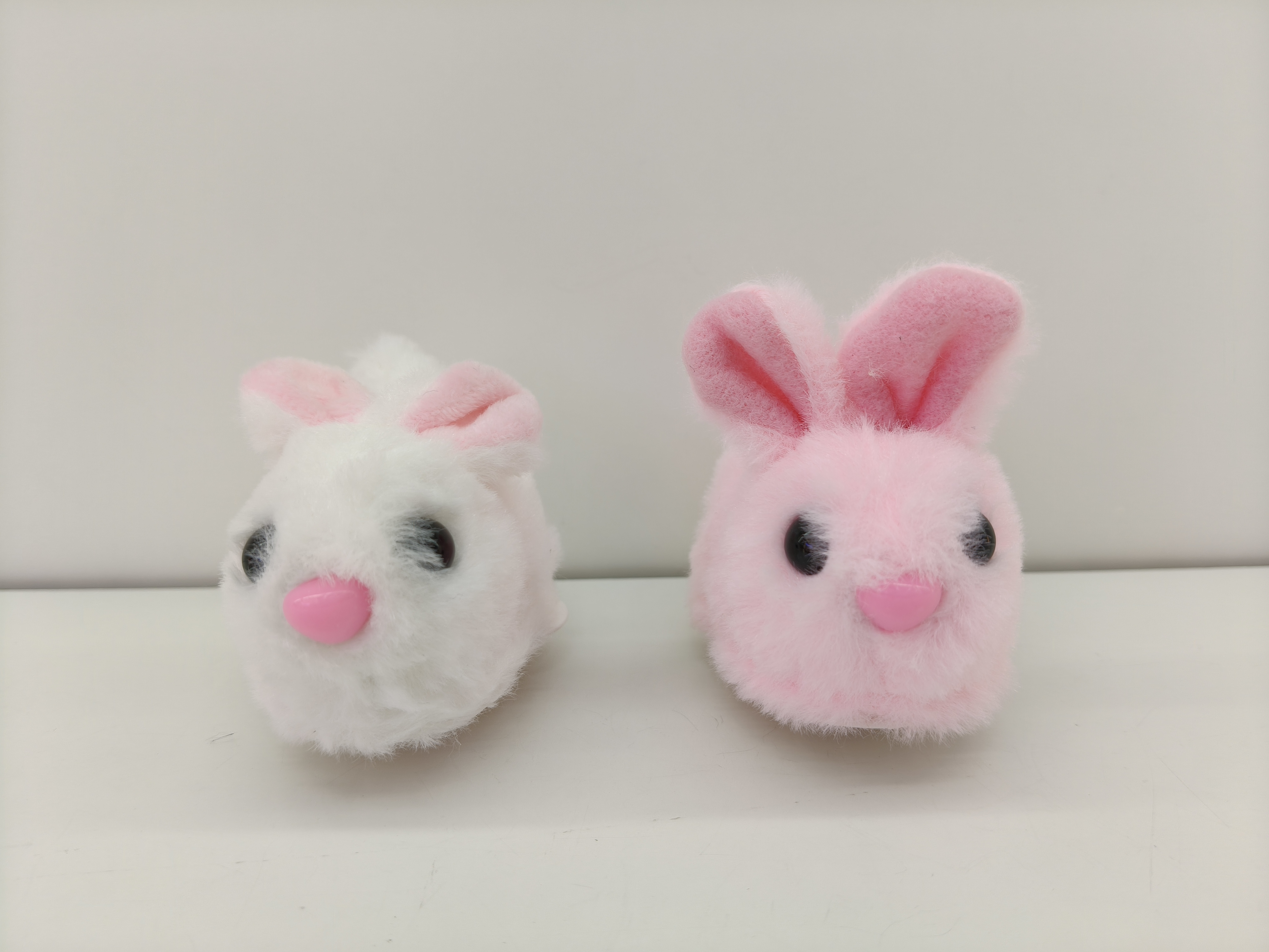 Pink transparent sphere, white plush rabbit, doll, claw toy, electric rabbit can run details Picture