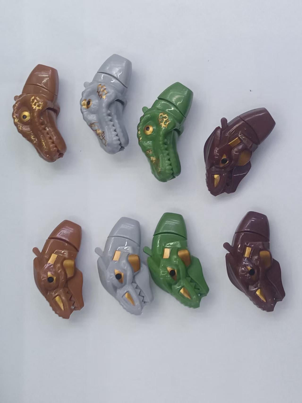 Two small dinosaur heads in four colors with mouth-opening dinosaur heads, creative mouth-opening crayon toys details Picture