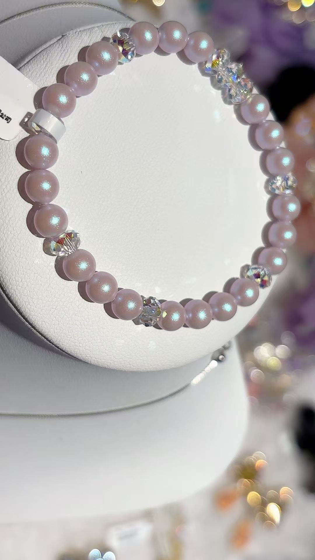 A light pink pearl bracelet decorated with transparent crystal beads, made of glass titanium steel, suitable for both men and women