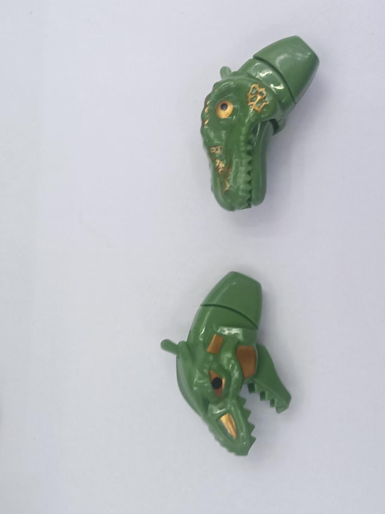 Two small dinosaur heads in four colors with mouth-opening dinosaur heads, creative mouth-opening crayon toys Application Scenario