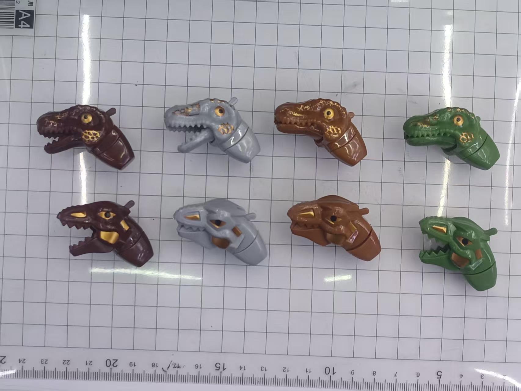 Two small dinosaur heads in four colors with mouth-opening dinosaur heads, creative mouth-opening crayon toys Specification image