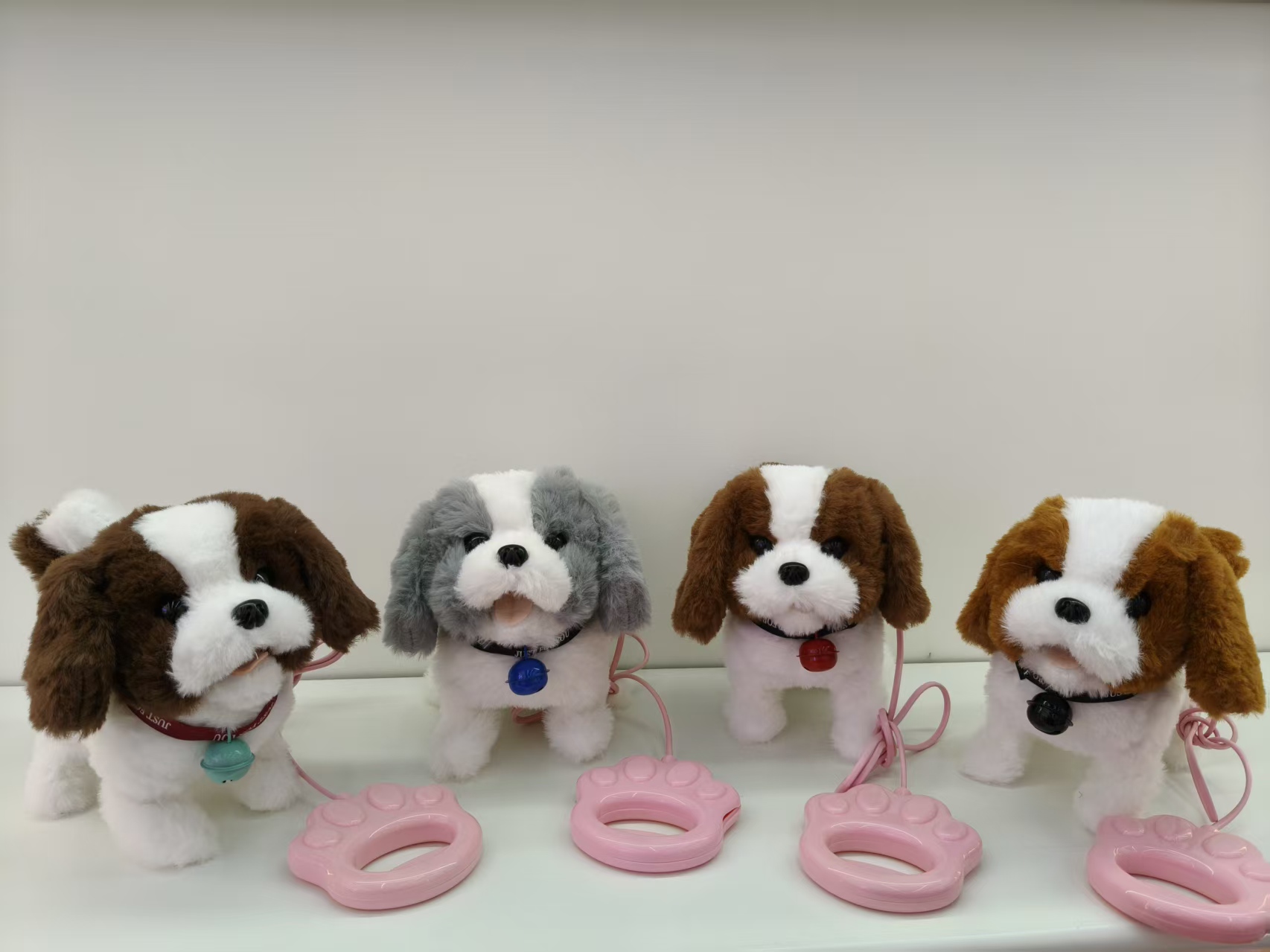 The toy dog will bark when it walks. It is a children's simulated electric plush puppy with a handle