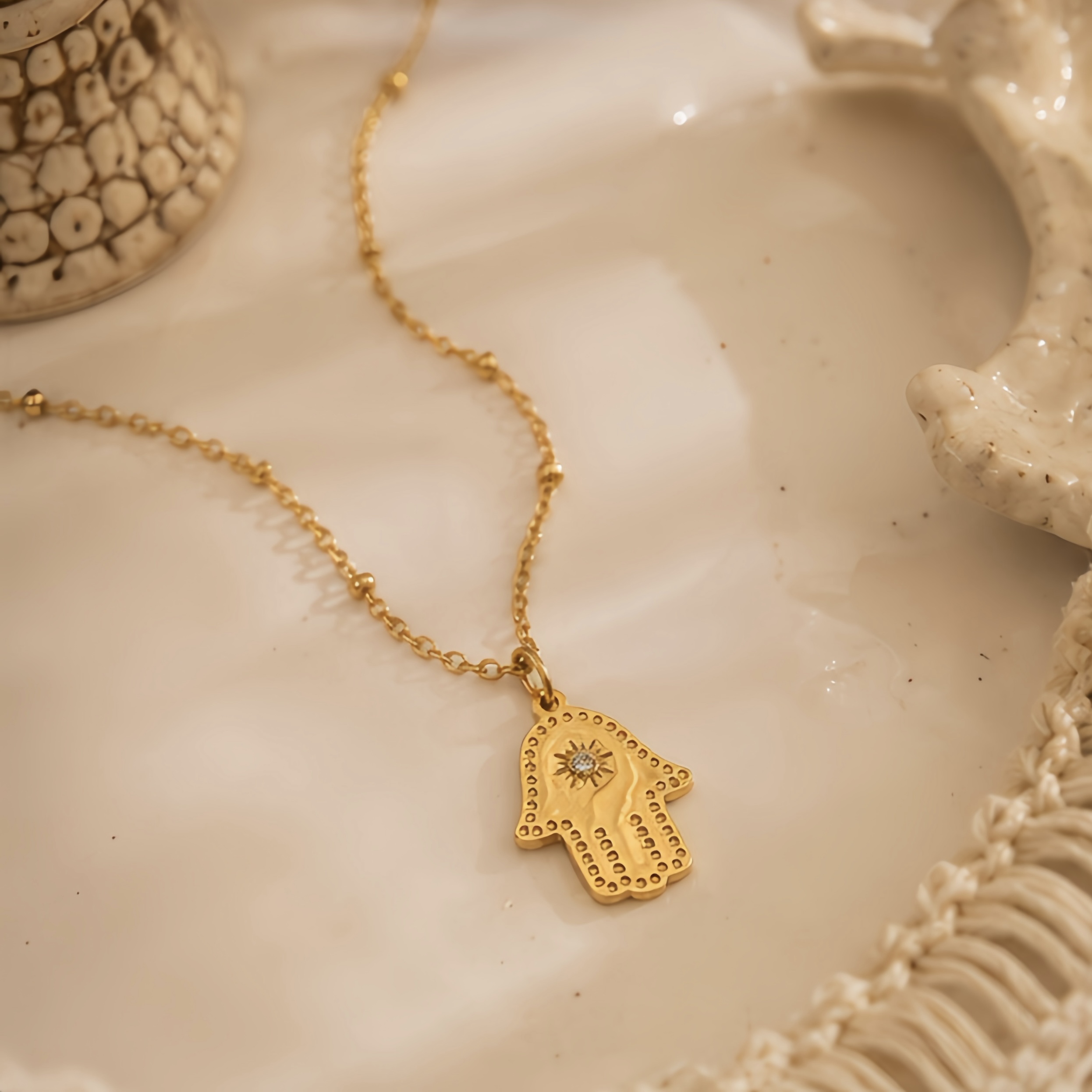Retro Fatima's hand relief sun diamond-encrusted pendant, stainless steel exotic accessory, a unique and long-lasting color preservation decorative necklace with a traditional style for daily commuting Application Scenario