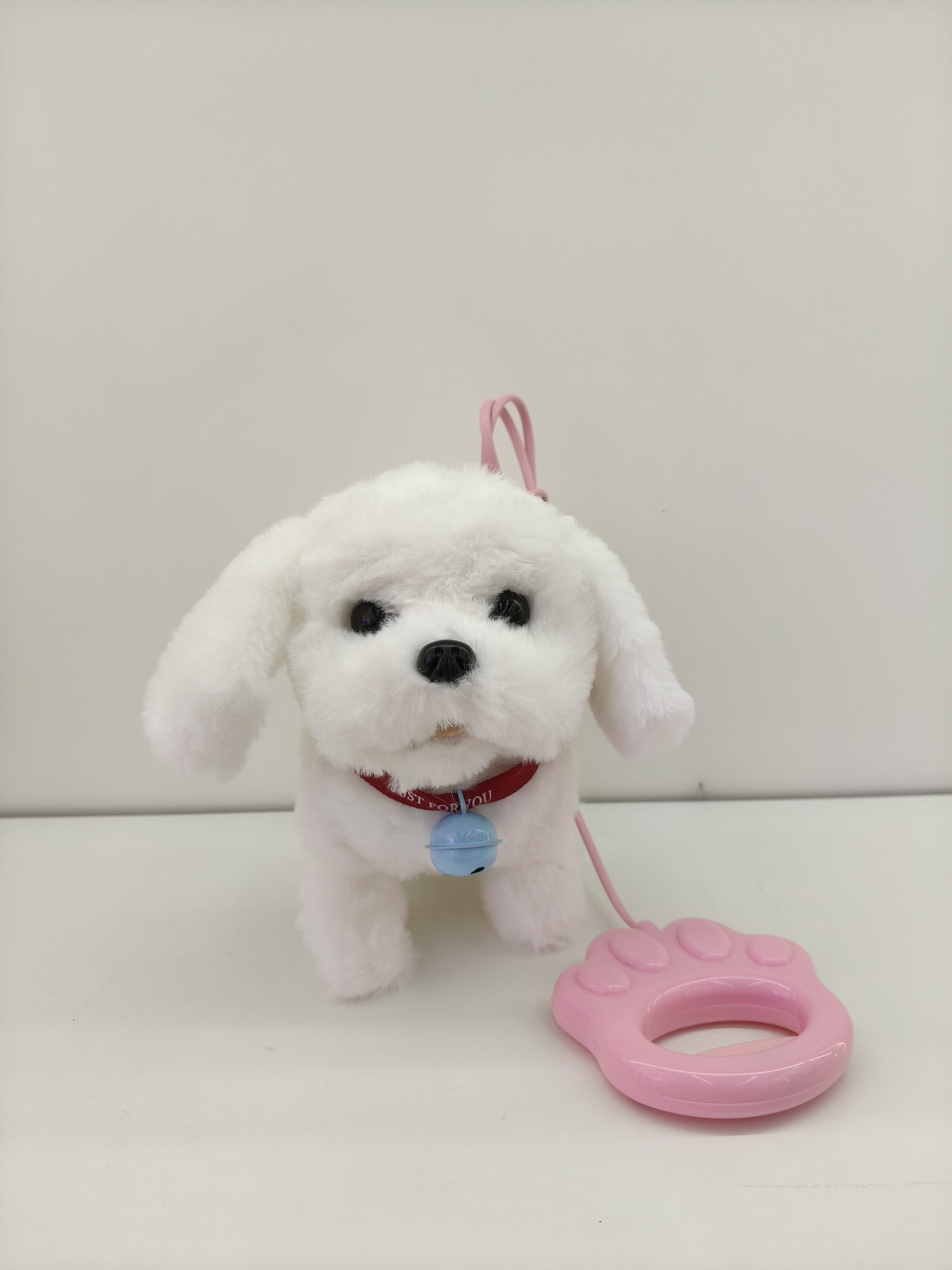 Four plush puppy toys, brown, light brown, pink and white with collars, bells, pink claw-shaped leash, pet toys Item Picture
