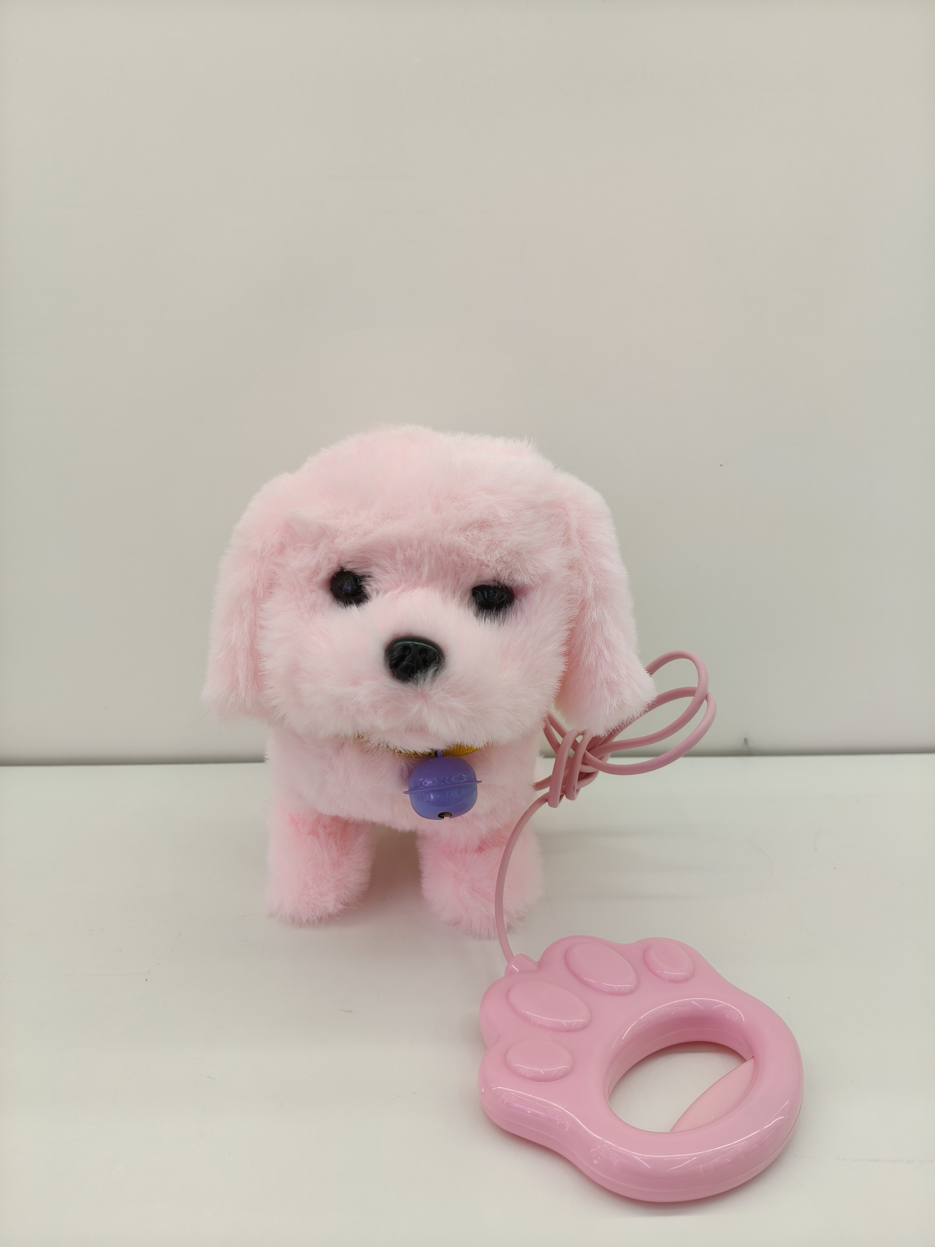 Four plush puppy toys, brown, light brown, pink and white with collars, bells, pink claw-shaped leash, pet toys Application Scenario
