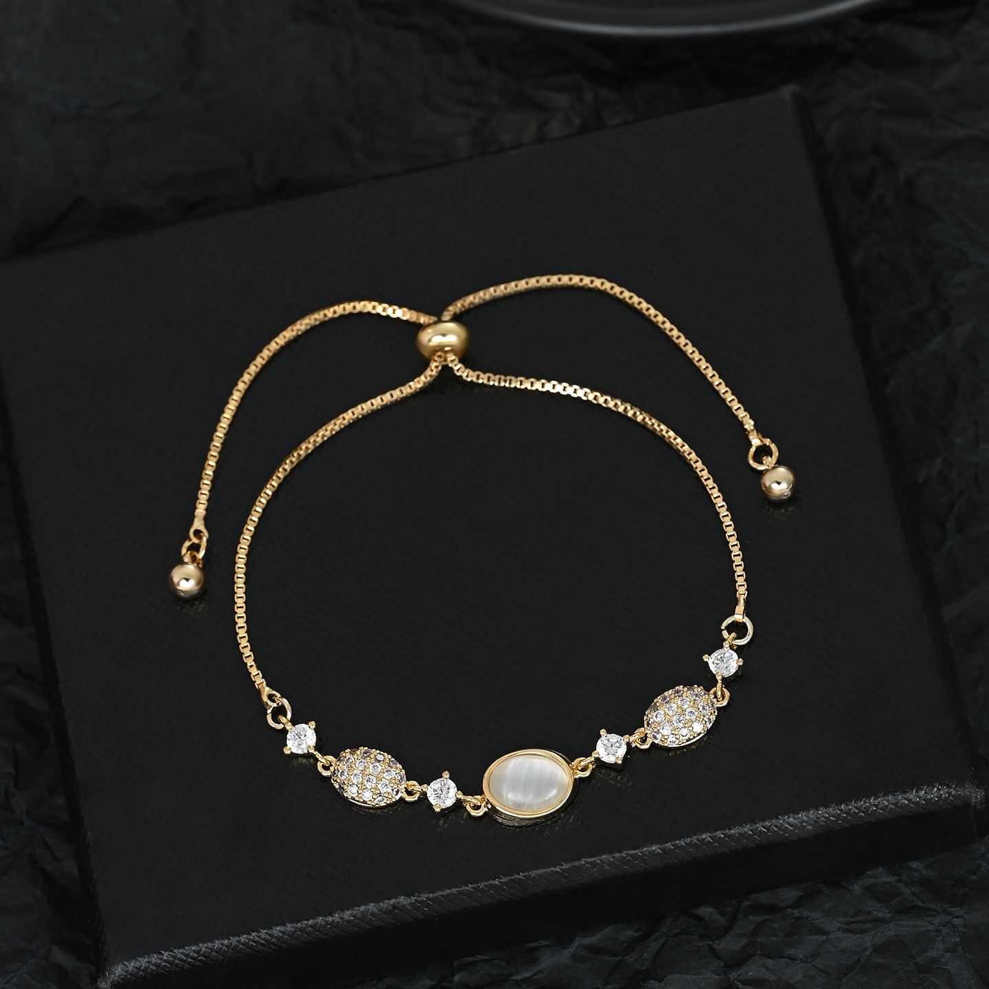 2026 New fashionable and versatile cat's eye stone water drop adjustable pull-out bracelet for daily use Specification image
