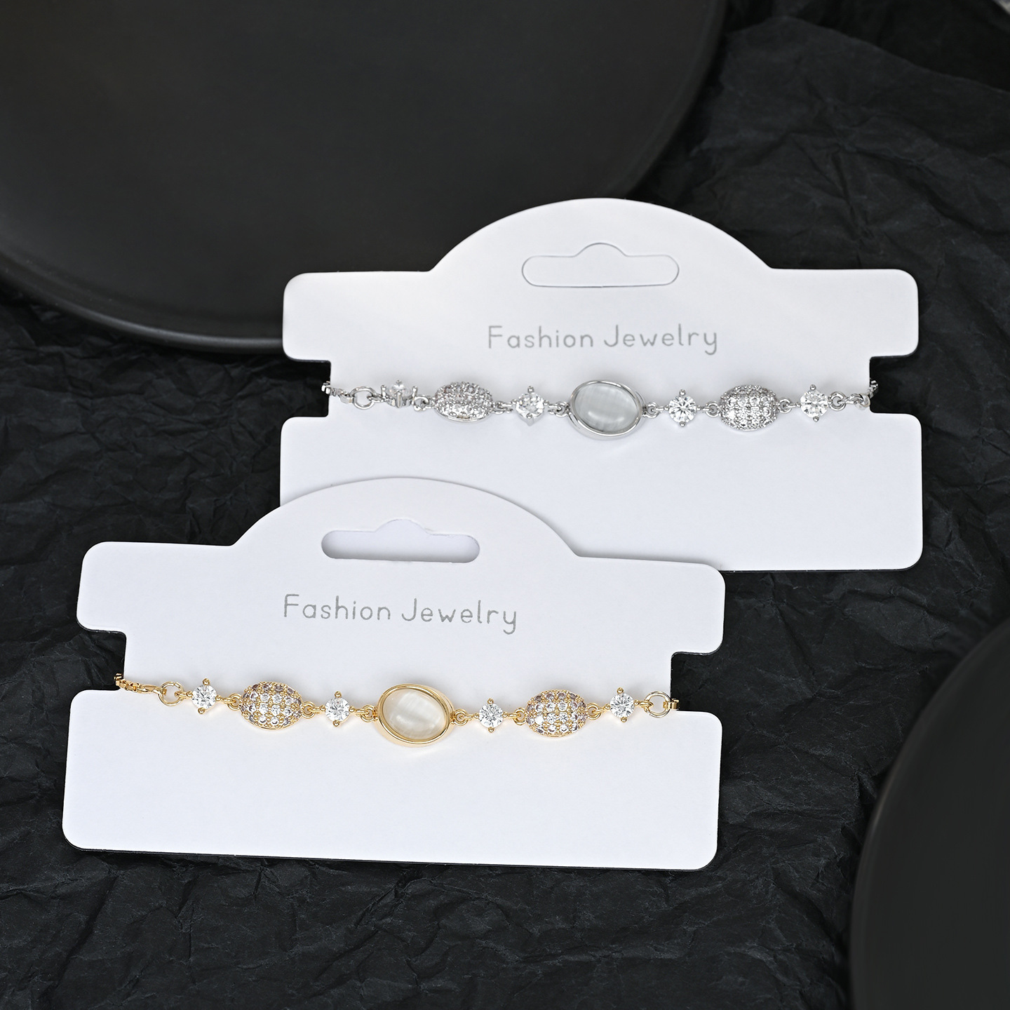 2026 New fashionable and versatile cat's eye stone water drop adjustable pull-out bracelet for daily use