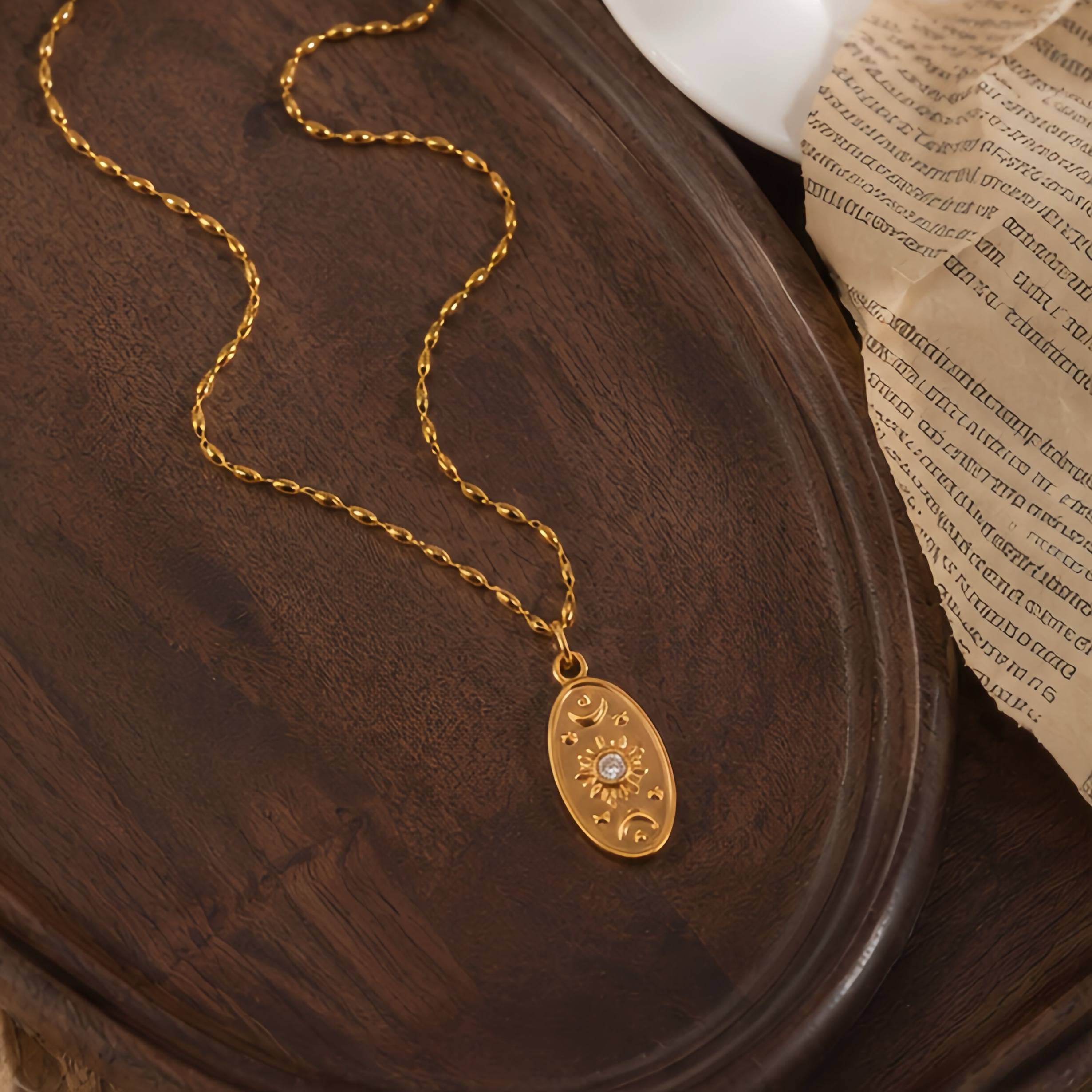 An oval, aged, embossed star, sun and moon, diamond-encrusted pendant, stainless steel, retro design, European and American street style, a unique and distinctive long collarbone necklace details Picture