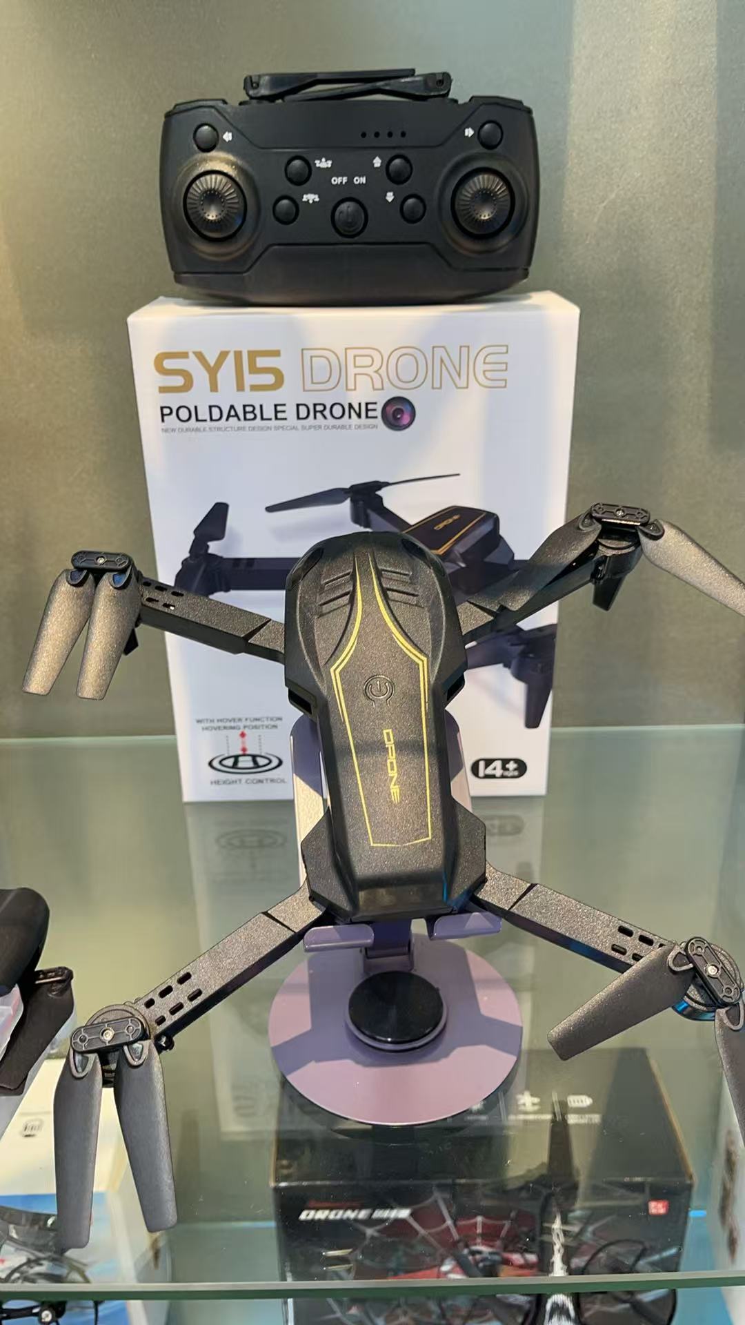 SY15 Black folding drone, a portable aerial photography remote control aircraft with a single camera details Picture