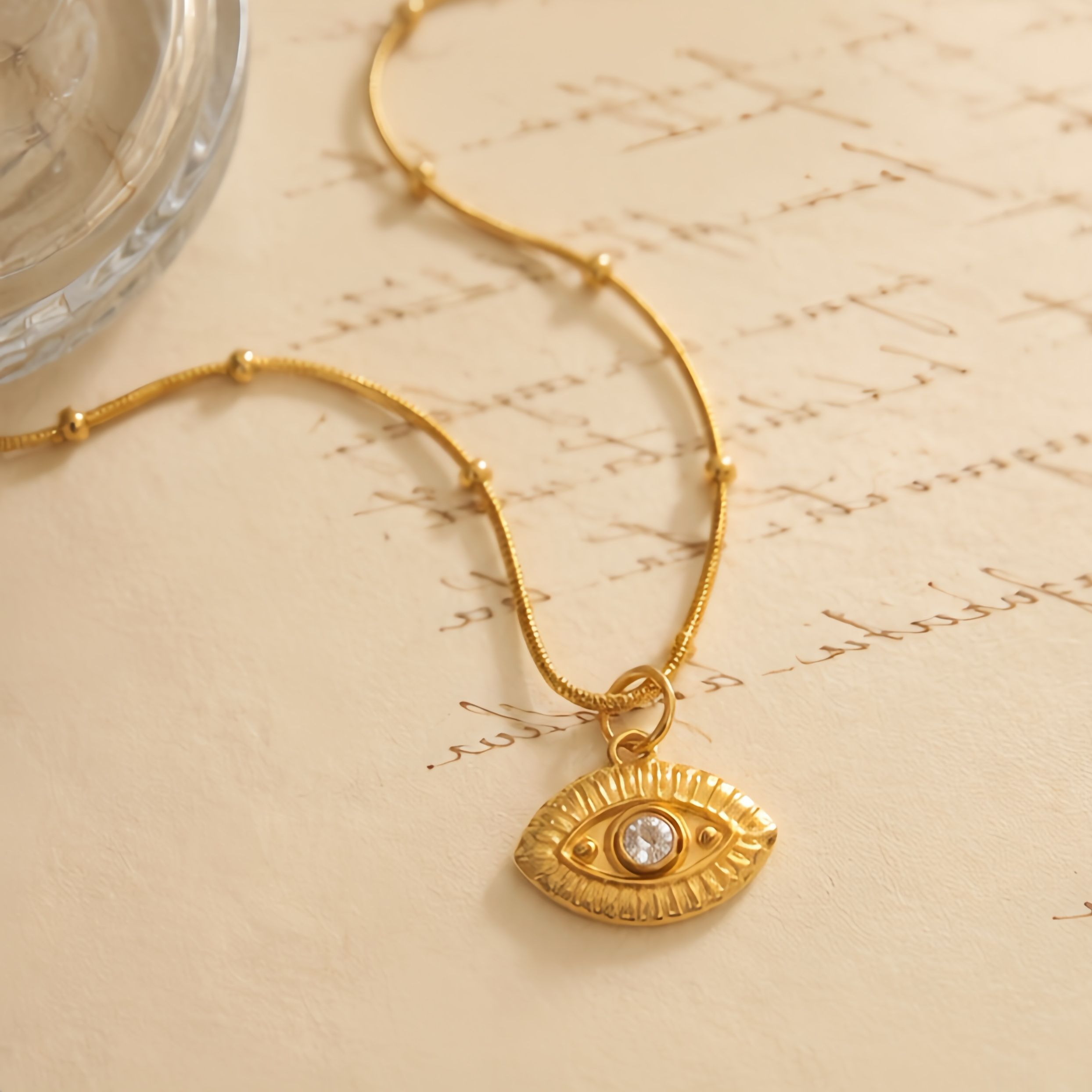 Medieval embossed devil's eye stainless steel snake bone chain, niche texture metal necklace, European and American style design, women's layered accessory Application Scenario