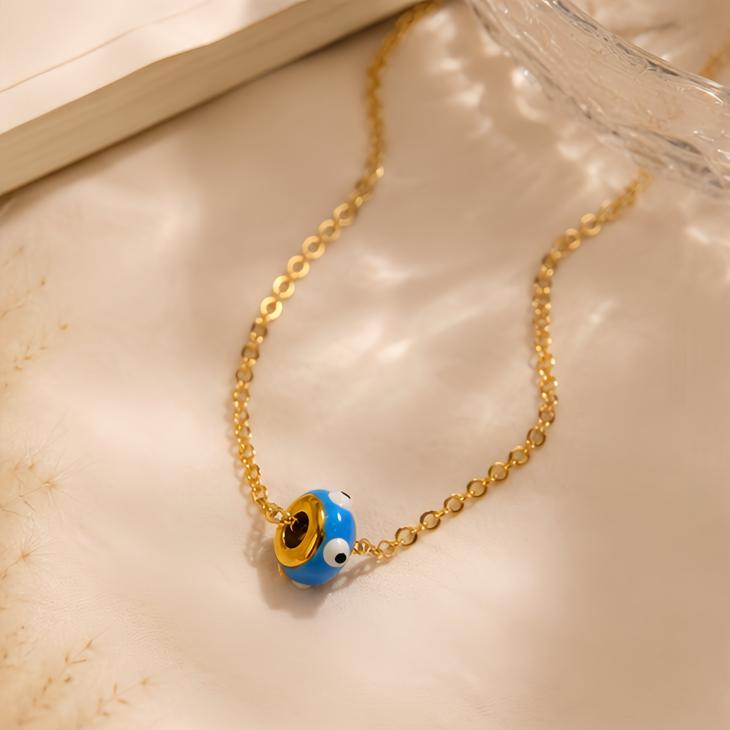 Blue background, big eyes, cartoon beads, stainless steel necklace, with a playful and quirky style for girls. It's a unique and eye-catching collarbone necklace that won't fade easily when worn daily Specification image