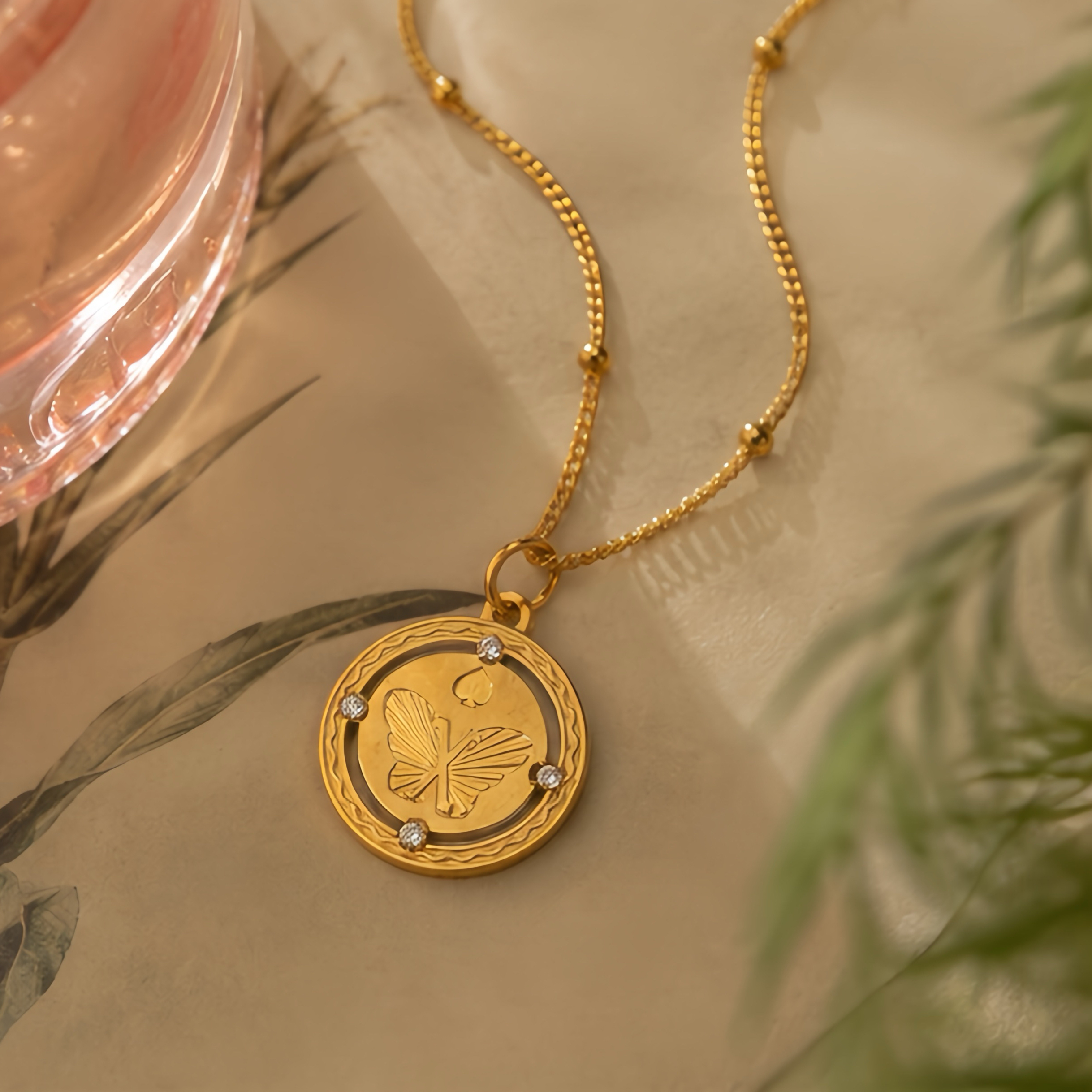 New Chinese-style relief butterfly hollowed-out round pendant, stainless steel small diamond corrugated frame snake bone chain, light mature style, niche atmosphere, daily versatile necklace
