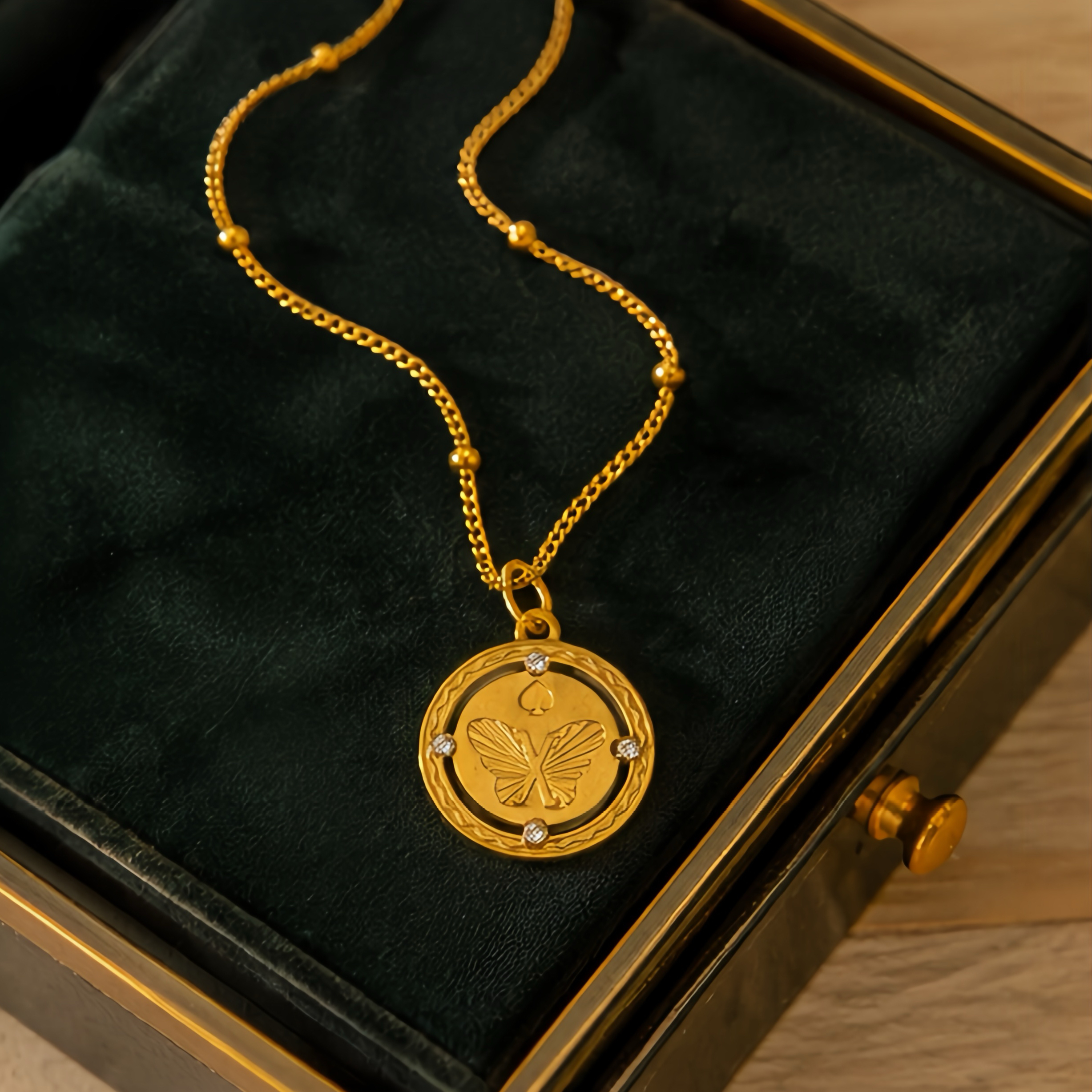 New Chinese-style relief butterfly hollowed-out round pendant, stainless steel small diamond corrugated frame snake bone chain, light mature style, niche atmosphere, daily versatile necklace Specification image
