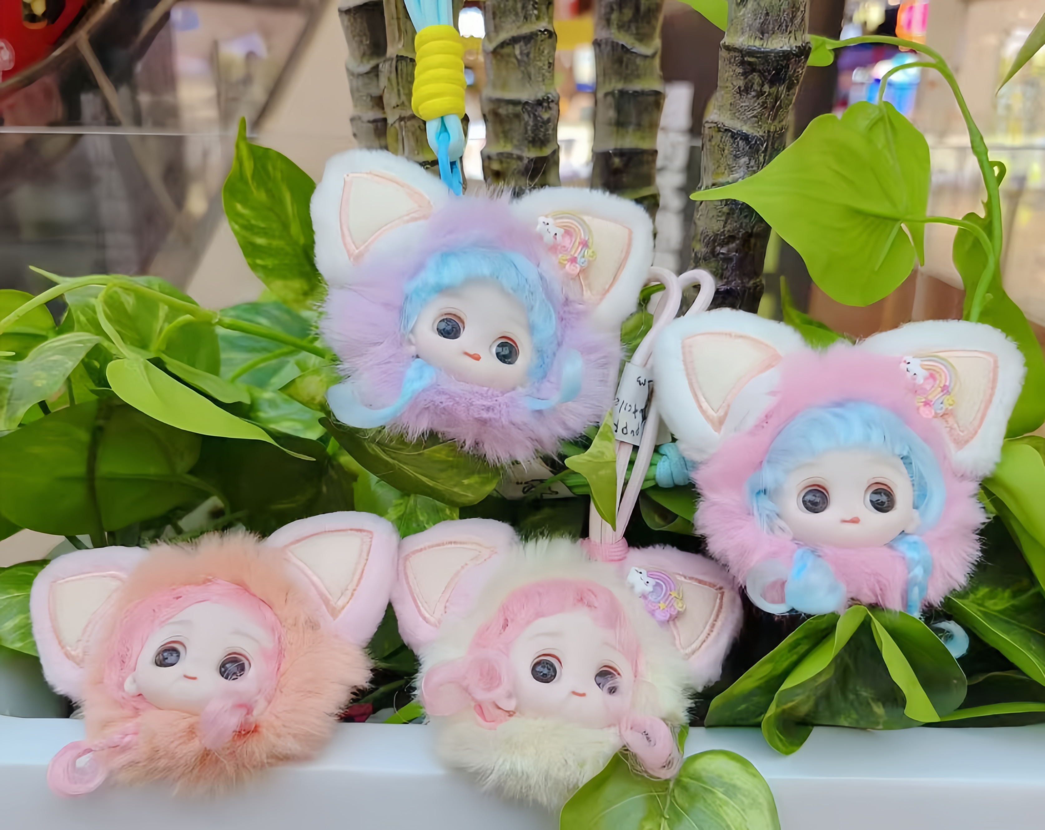 The doll keychain pendant is a cute and small simulation doll that can be hung on the schoolbag