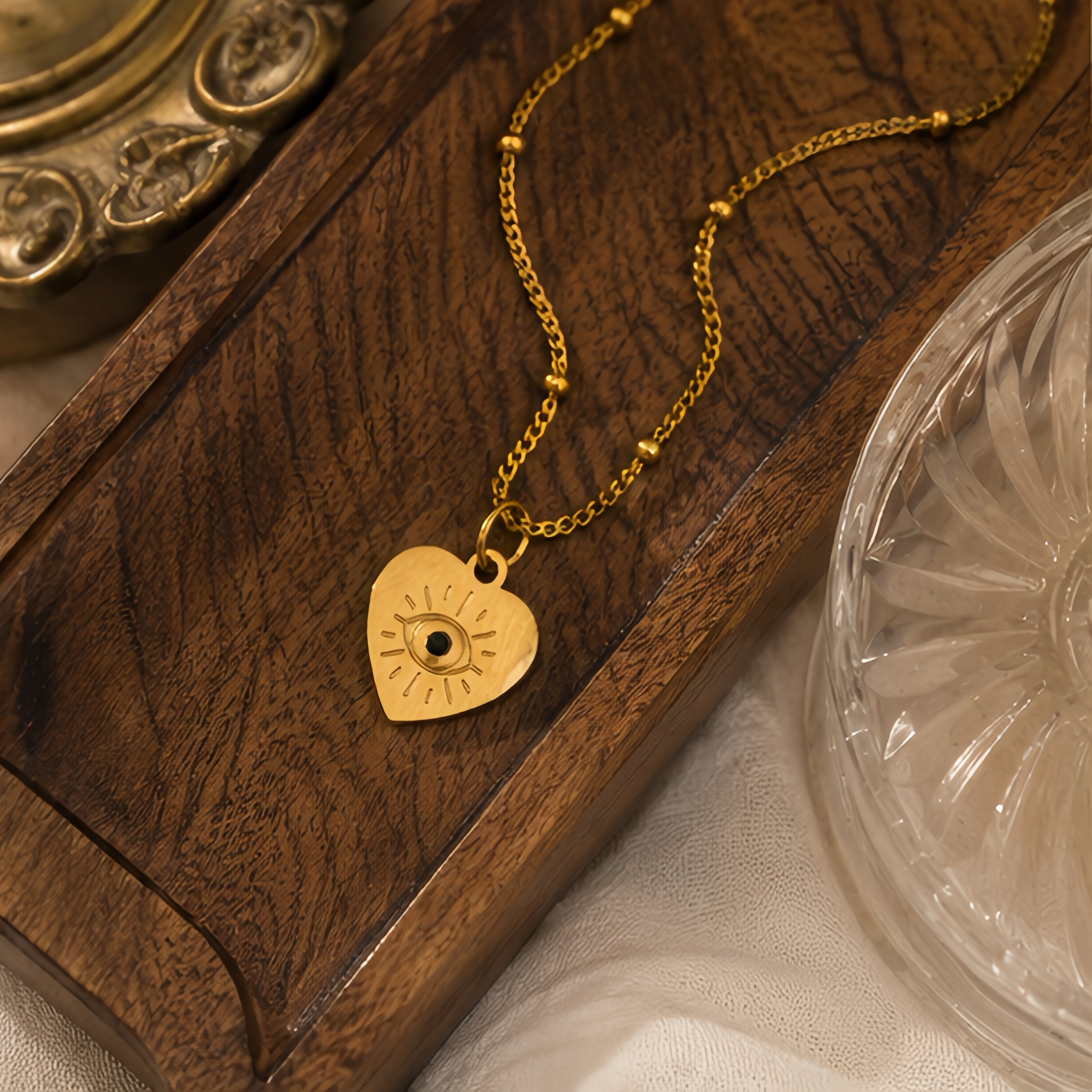 Heart-shaped outline devil's eye carved pendant, stainless steel, retro exotic style, niche, mature texture, simple commuting daily wear neck accessory details Picture