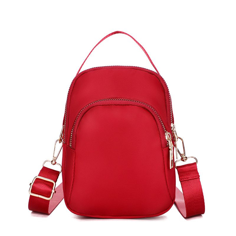 2022 new style nylon crossbody small bag, casual large-capacity hand-held shell bag, single-shoulder phone bag, versatile women's bag undefined