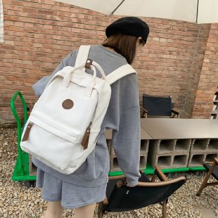 Japanese-style ins girl backpack, Korean-style junior high school student schoolbag, large-capacity solid-color nylon hand-held backpack for trendy girls undefined