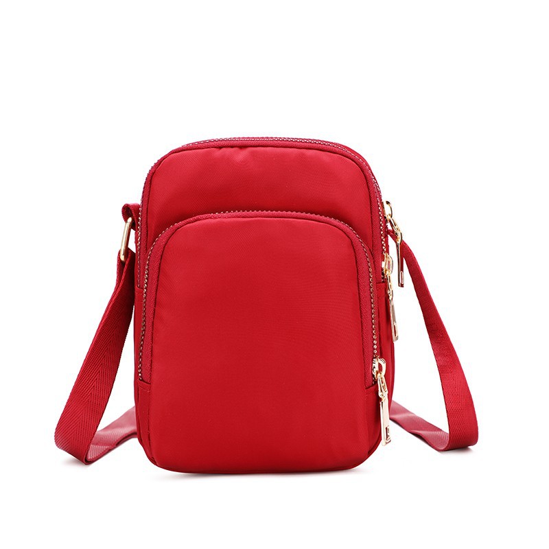 A 2022 new trendy and versatile women's bag made of Oxford fabric, a lightweight single-shoulder crossbody bag with loose change, a mobile phone bag and a mini bag Item Picture