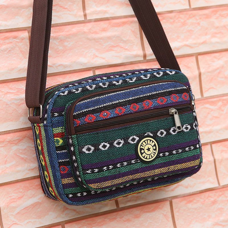 Ethnic style women's bag manufacturer wholesale new fashionable canvas crossbody bags for middle-aged and elderly people with multiple compartments and large capacity single-shoulder bags undefined